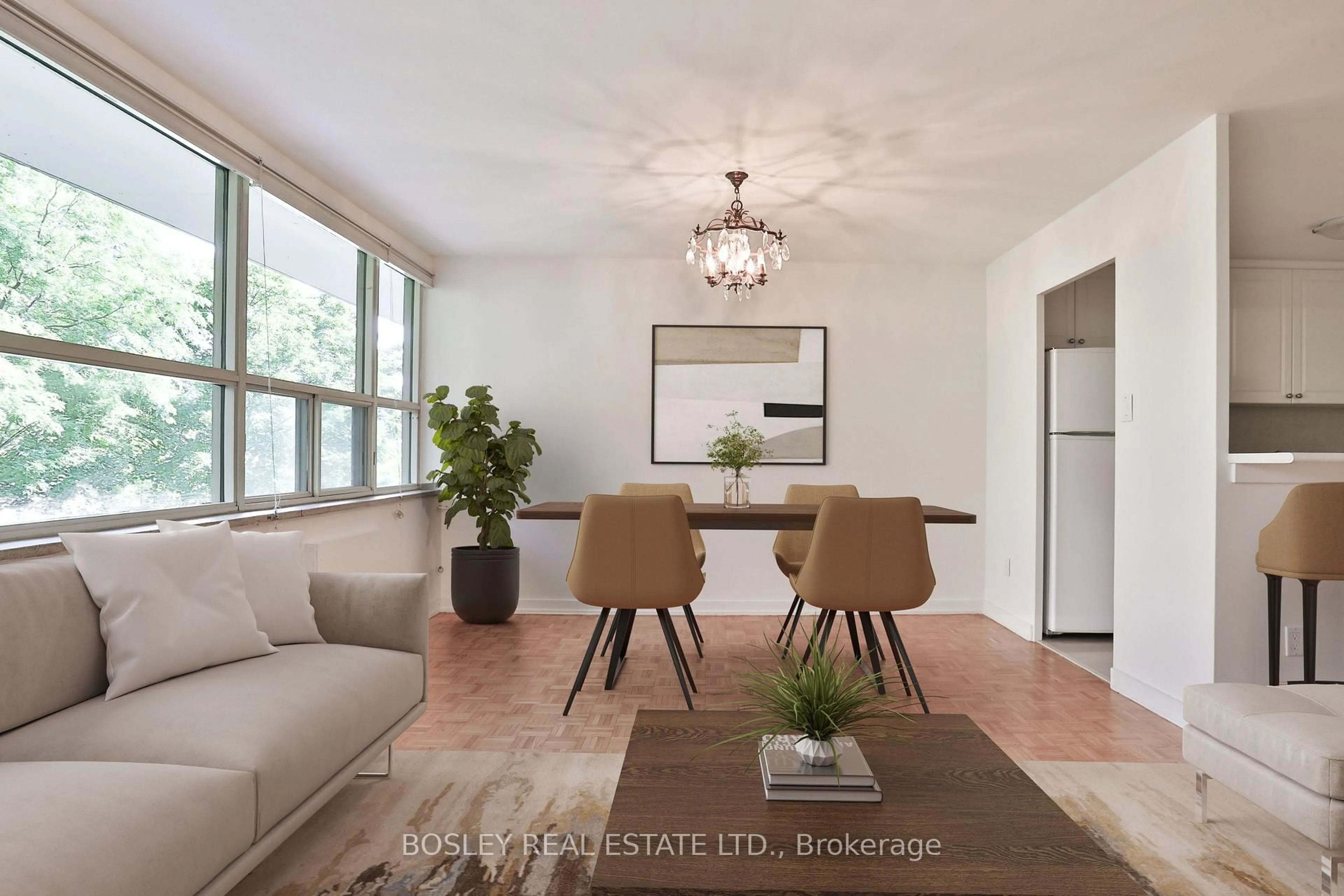 Living room with furniture, wood/laminate floor for 160 The Donway W #104, Toronto Ontario M3C 2G1