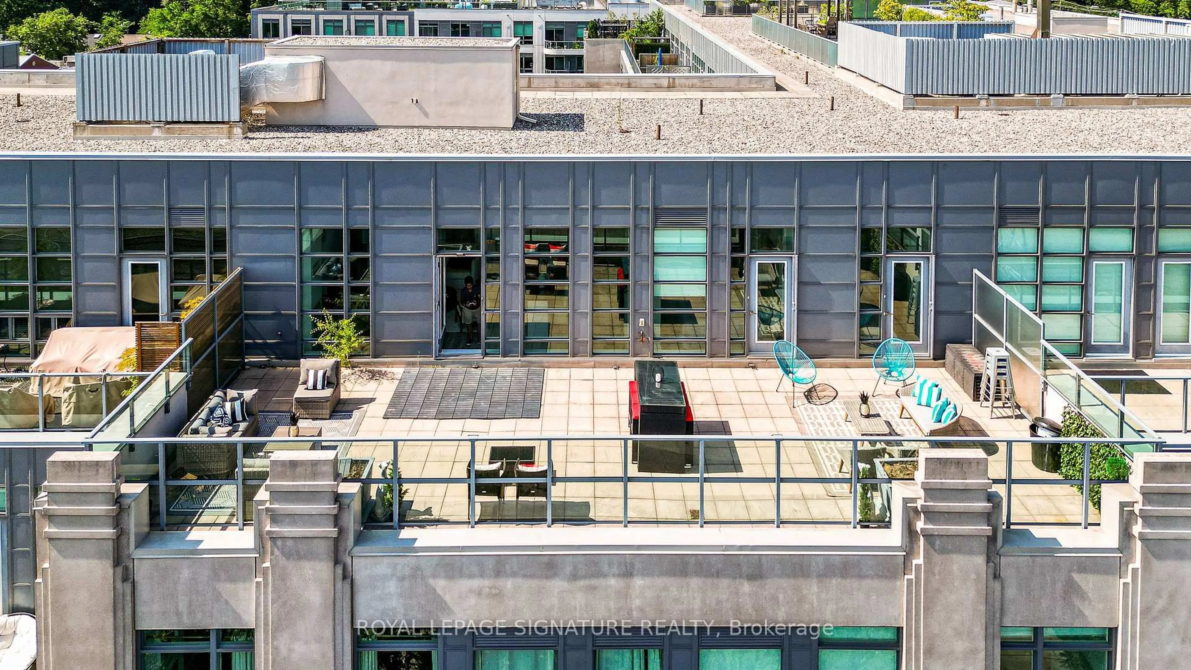 Patio, city buildings view from balcony for 380 Macpherson Ave #615, Toronto Ontario M4V 3E3