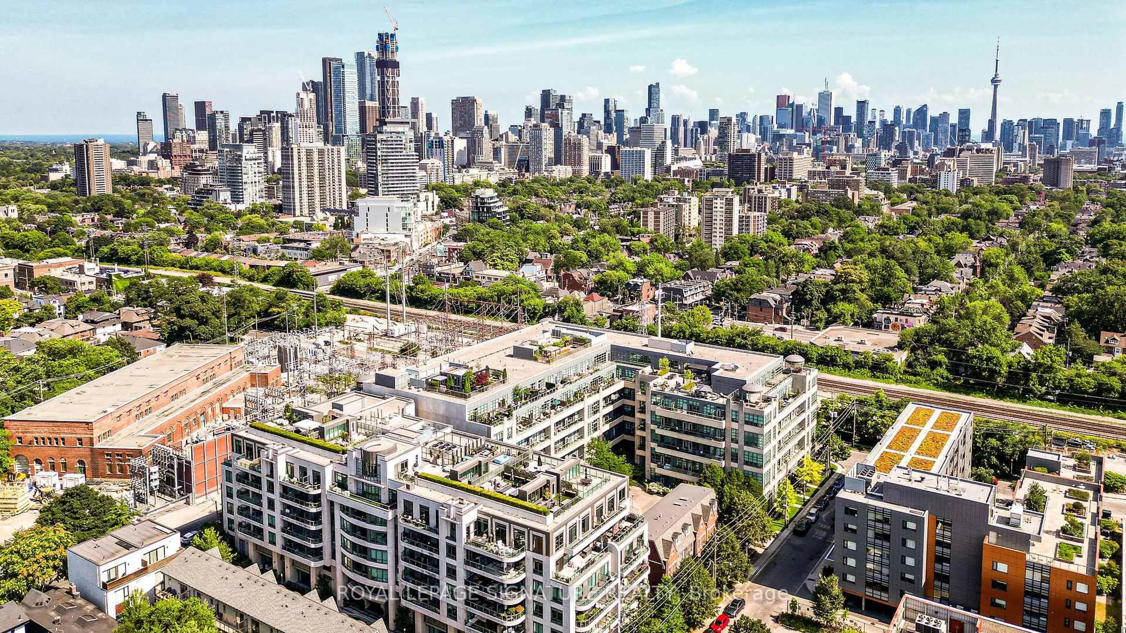 A pic from outside/outdoor area/front of a property/back of a property/a pic from drone, city buildings view from balcony for 380 Macpherson Ave #615, Toronto Ontario M4V 3E3