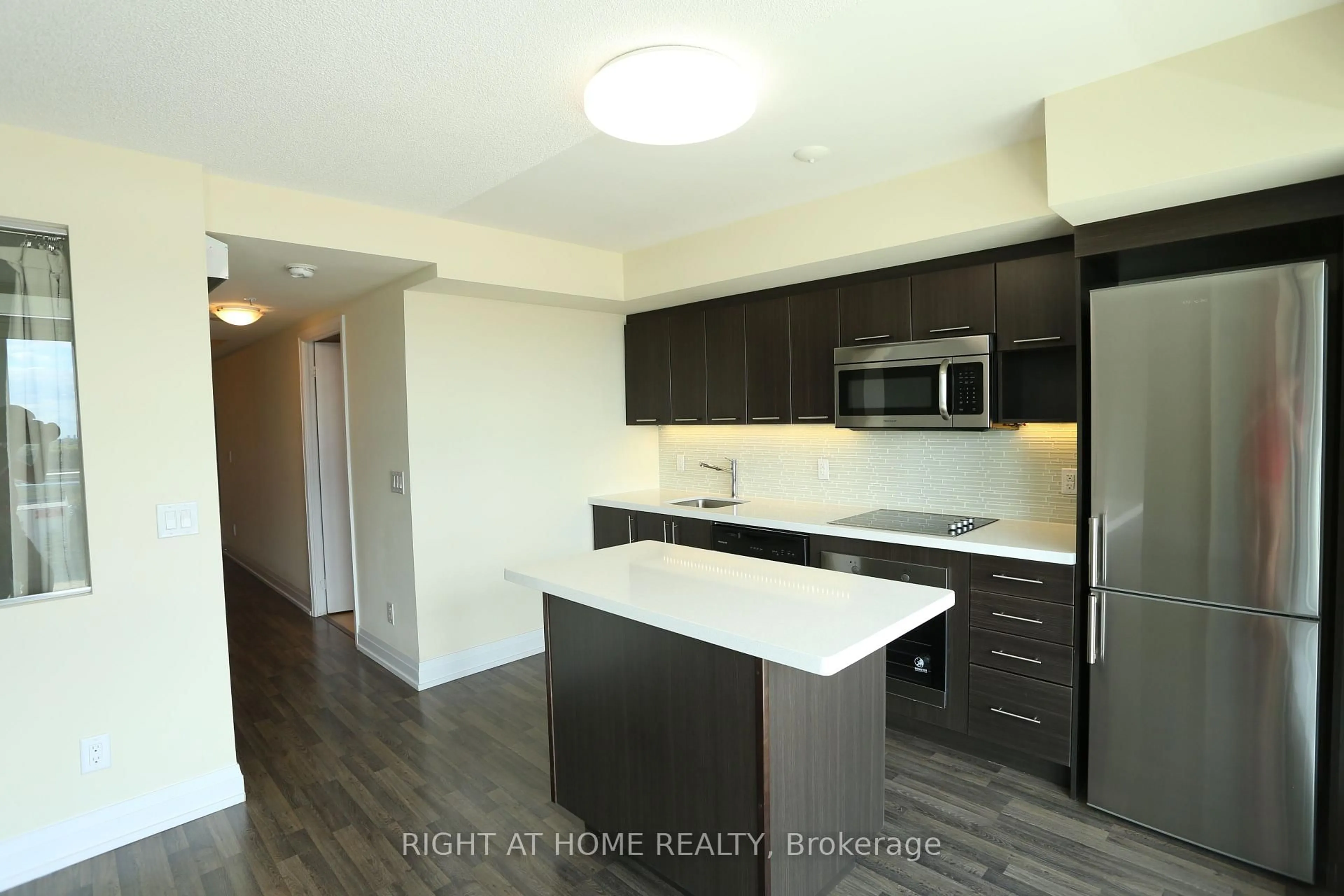 Standard kitchen, wood/laminate floor for 555 Wilson Ave #1208E, Toronto Ontario M3H 0C5