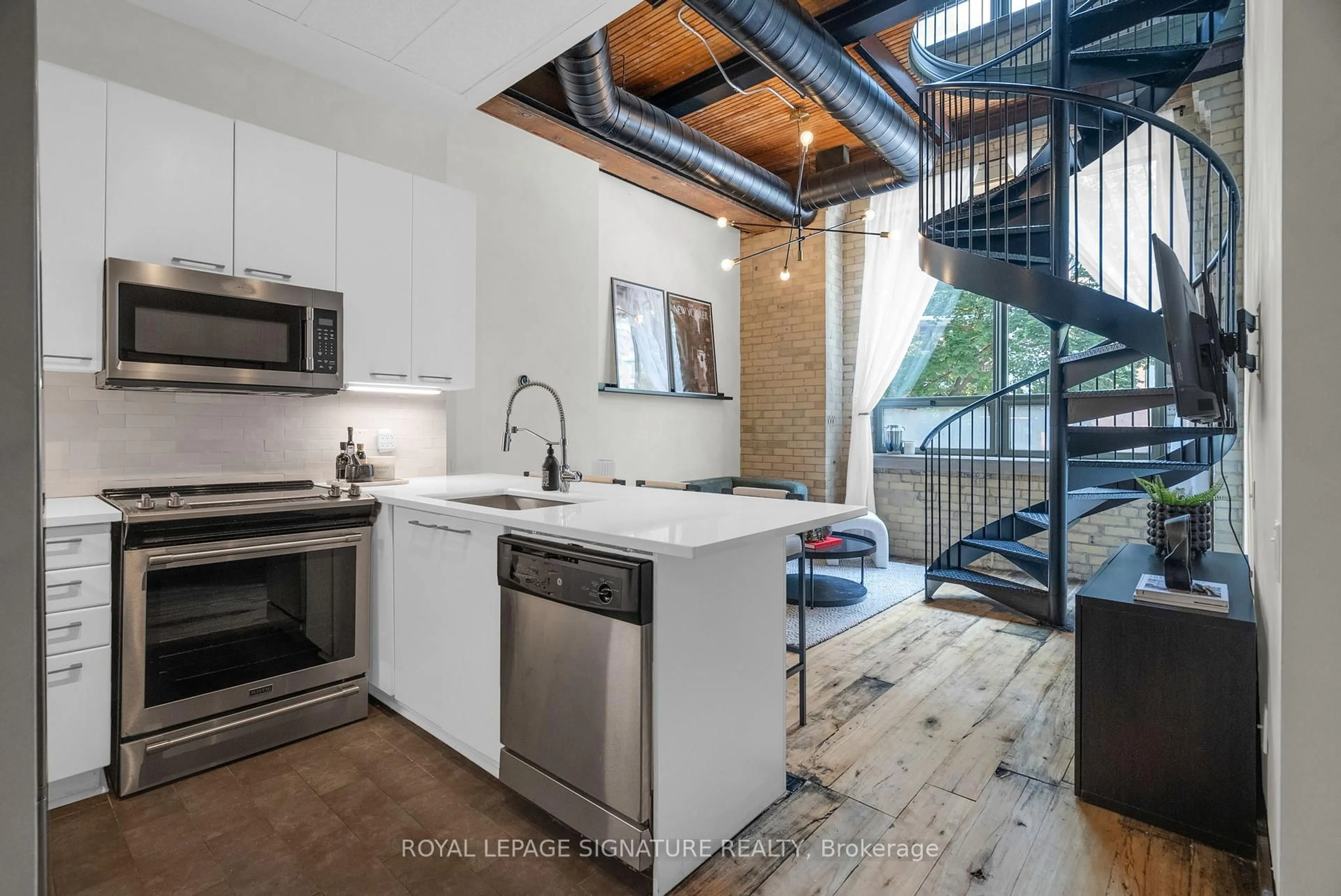 Open concept kitchen, cement floor for 781 King St #206, Toronto Ontario M5V 3L5