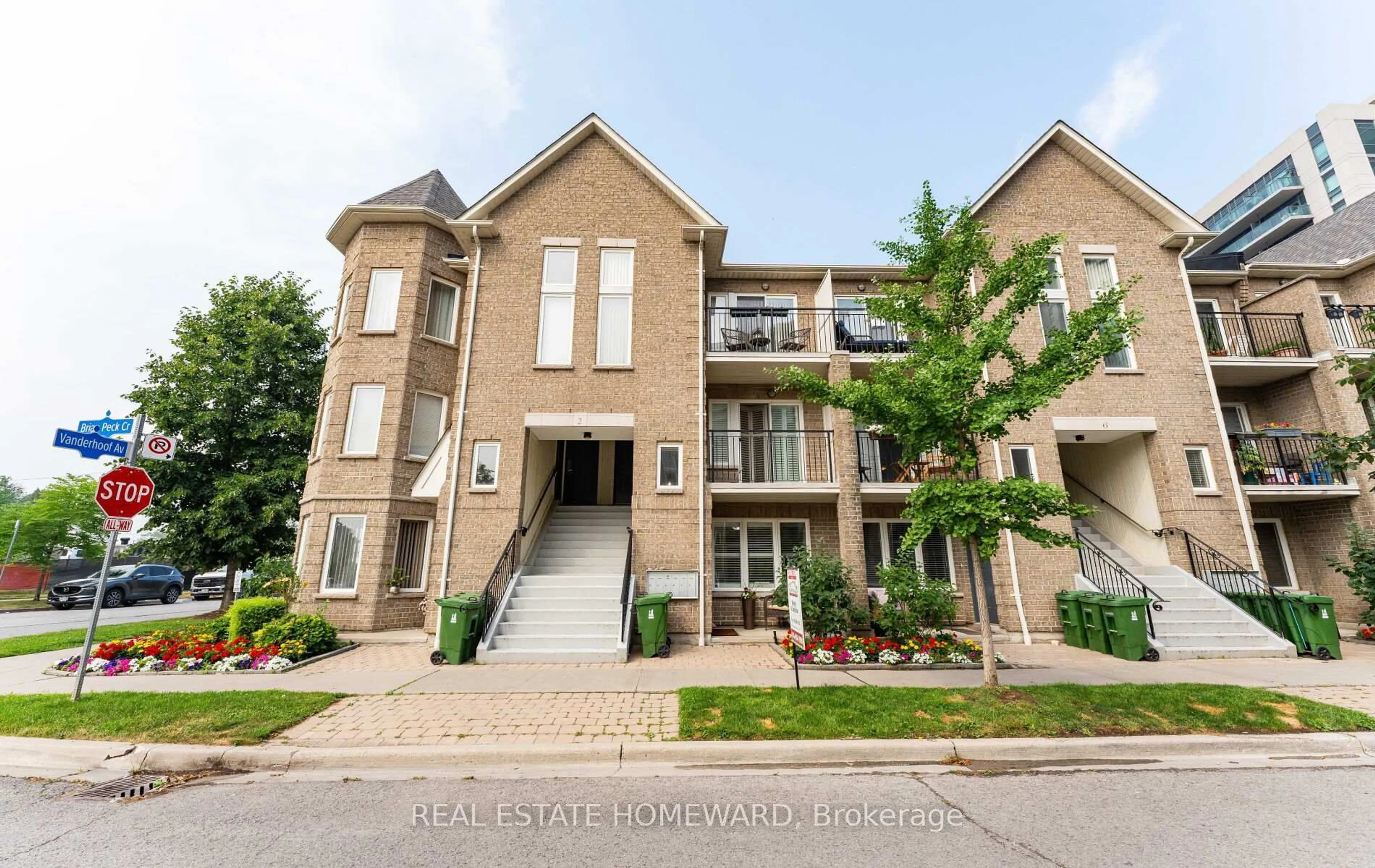 Home with brick exterior material, street for 2 Brian Peck Cres #102, Toronto Ontario M4G 4K4
