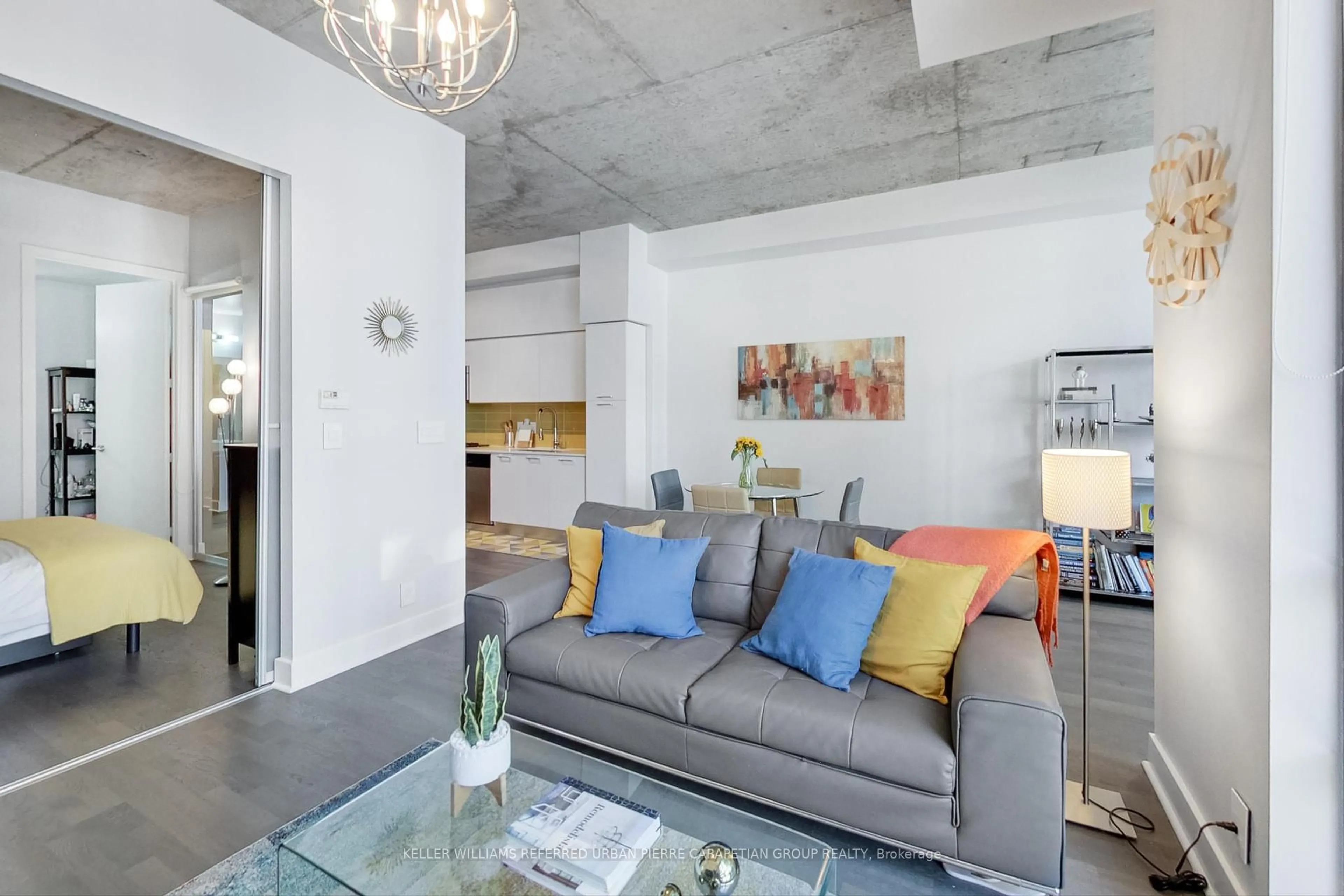 Living room with furniture, cement floor for 399 Adelaide St #520, Toronto Ontario M5V 1S4
