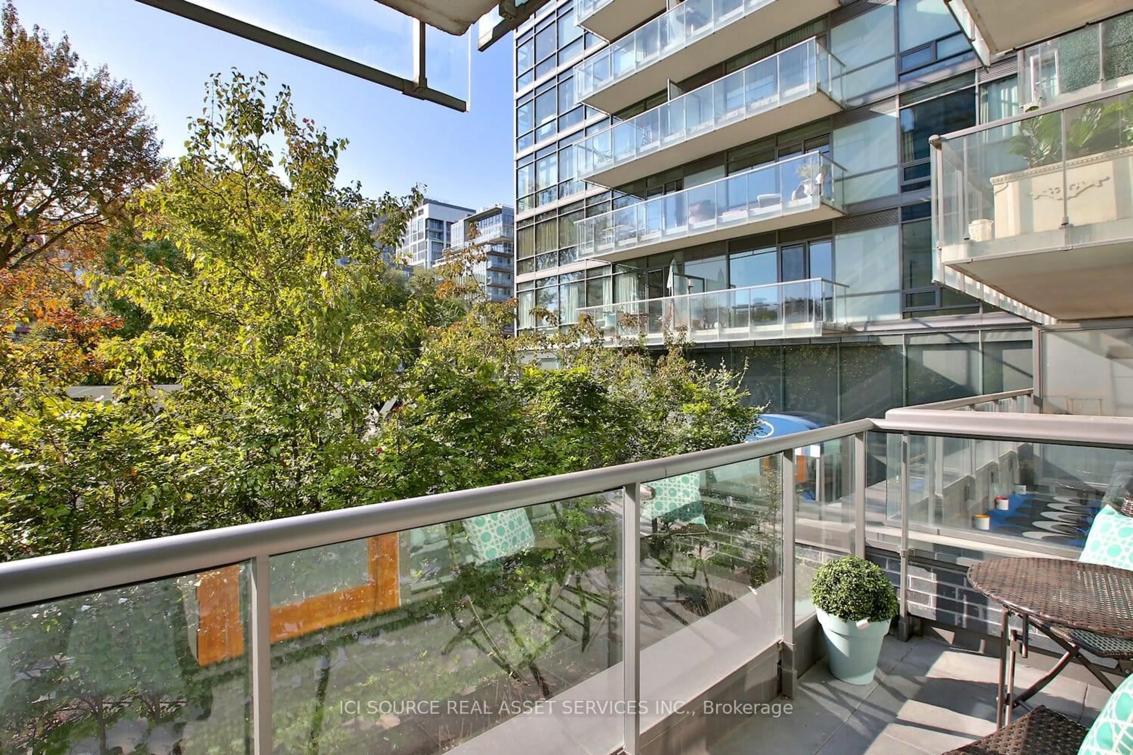 Balcony in the apartment, city buildings view from balcony for 55 Stewart St #123, Toronto Ontario M5V 2V1