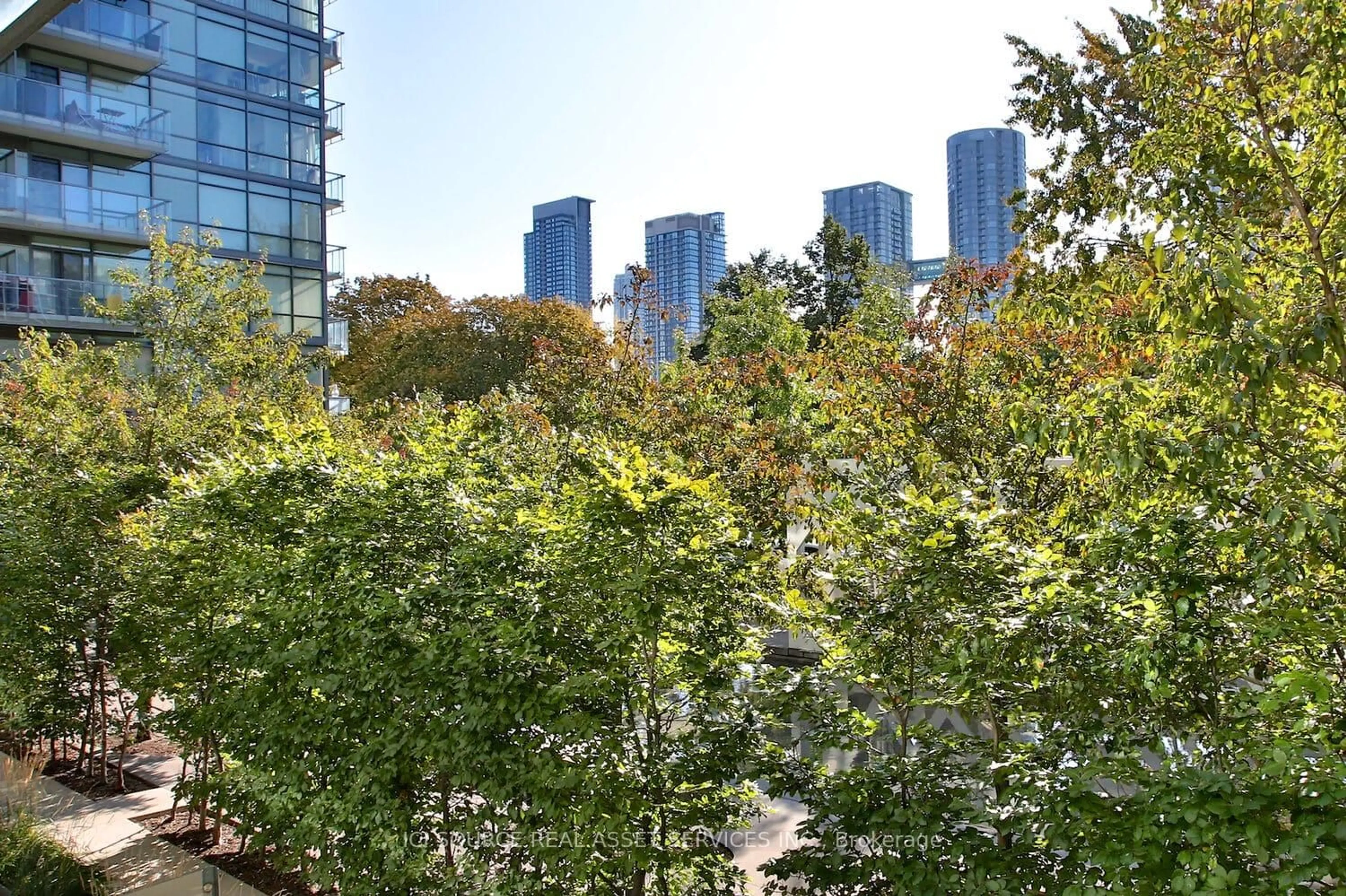 Patio, city buildings view from balcony for 55 Stewart St #123, Toronto Ontario M5V 2V1