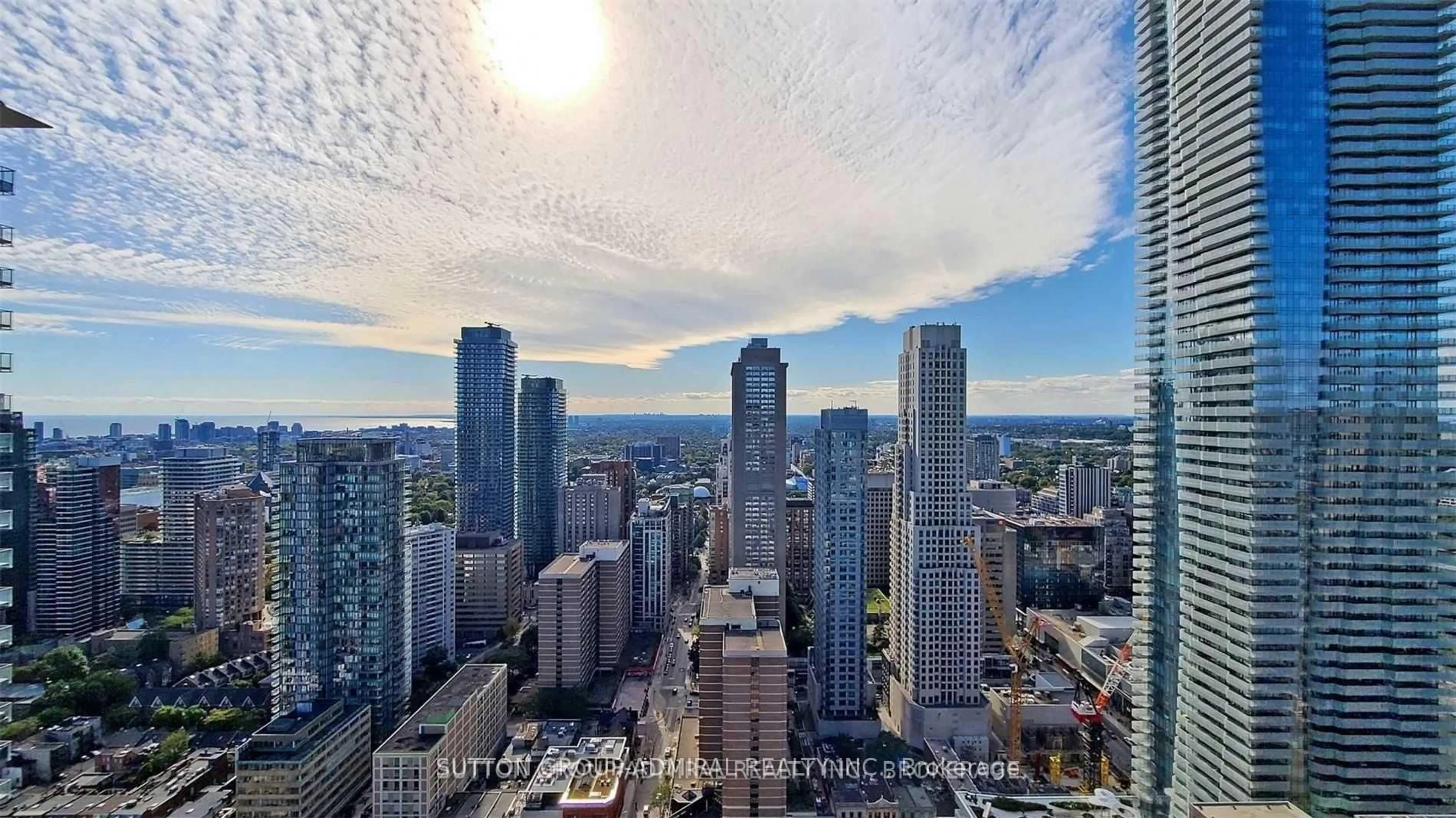 A pic from outside/outdoor area/front of a property/back of a property/a pic from drone, city buildings view from balcony for 42 Charles St #4105, Toronto Ontario M4Y 0B7