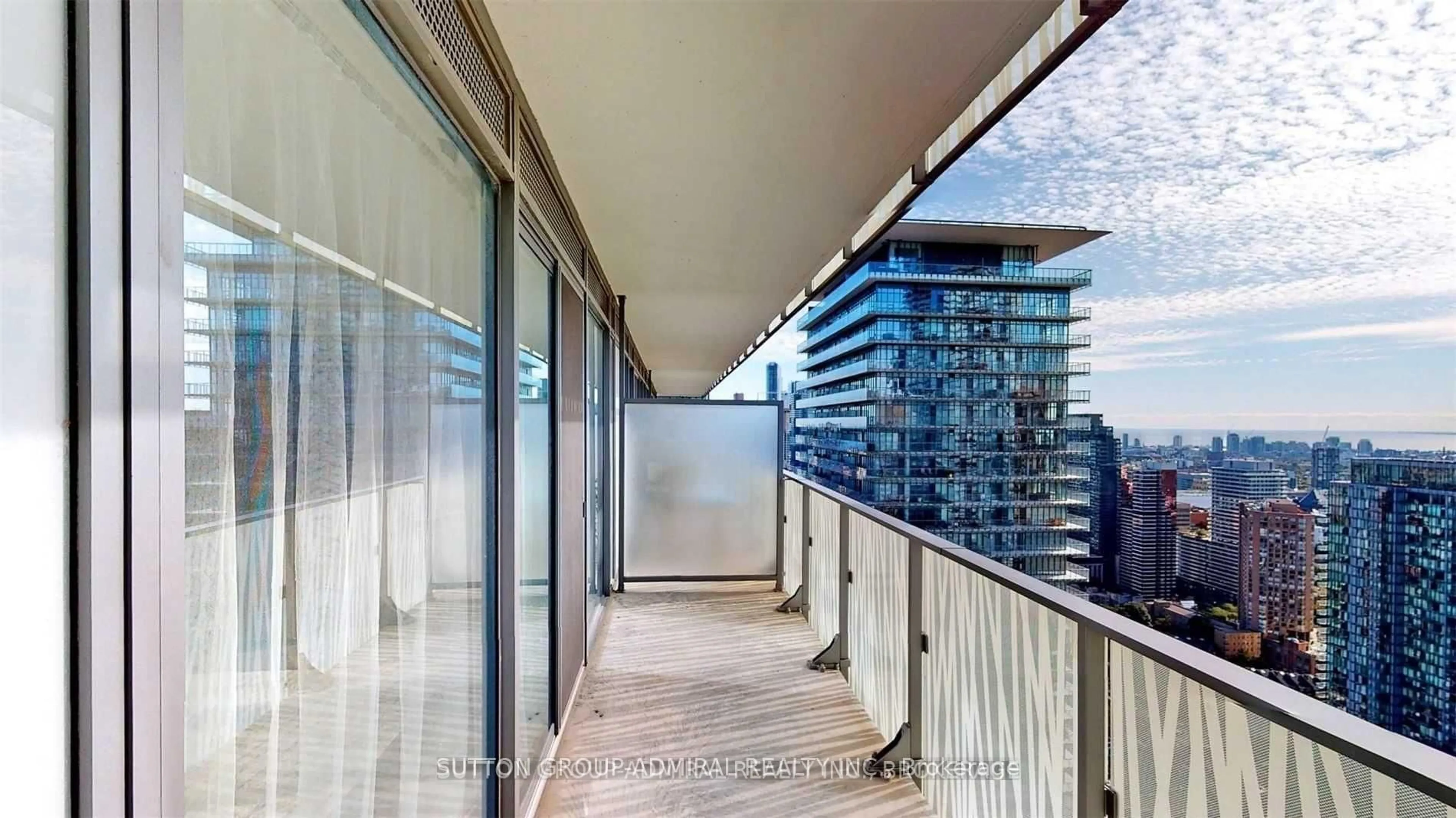 Balcony in the apartment, city buildings view from balcony for 42 Charles St #4105, Toronto Ontario M4Y 0B7