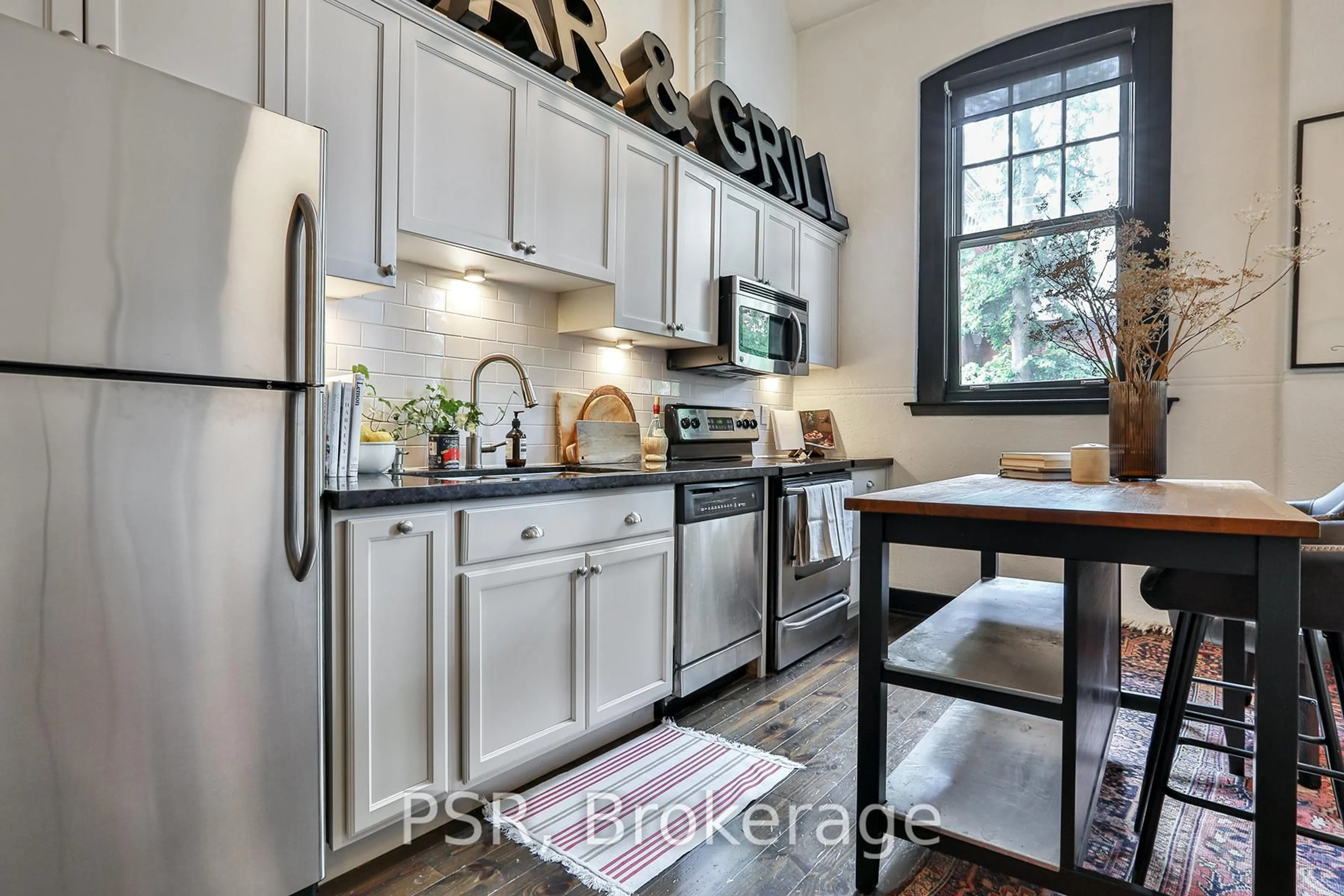 Open concept kitchen, ceramic/tile floor for 183 Dovercourt Rd #207, Toronto Ontario M6J 3C1