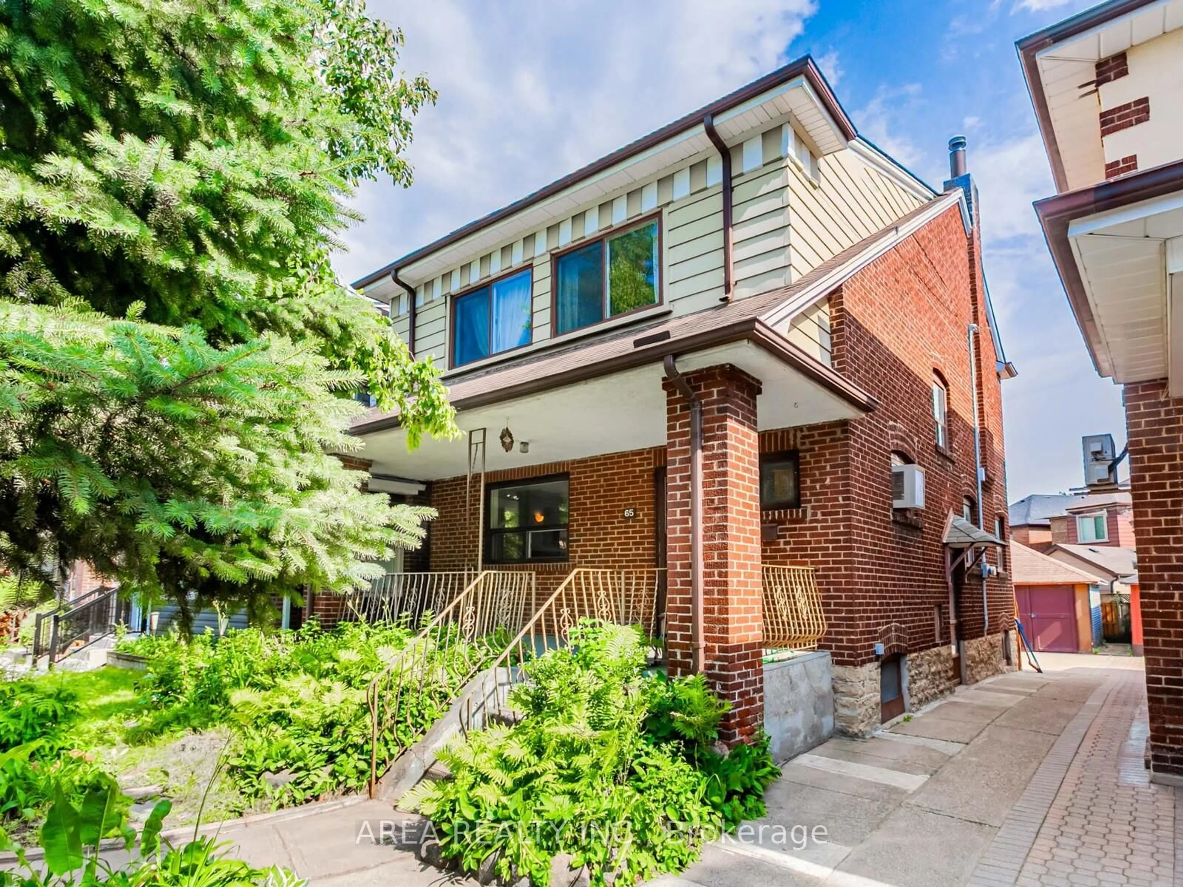 Home with brick exterior material, street for 65 St Annes Rd, Toronto Ontario M6J 2C4
