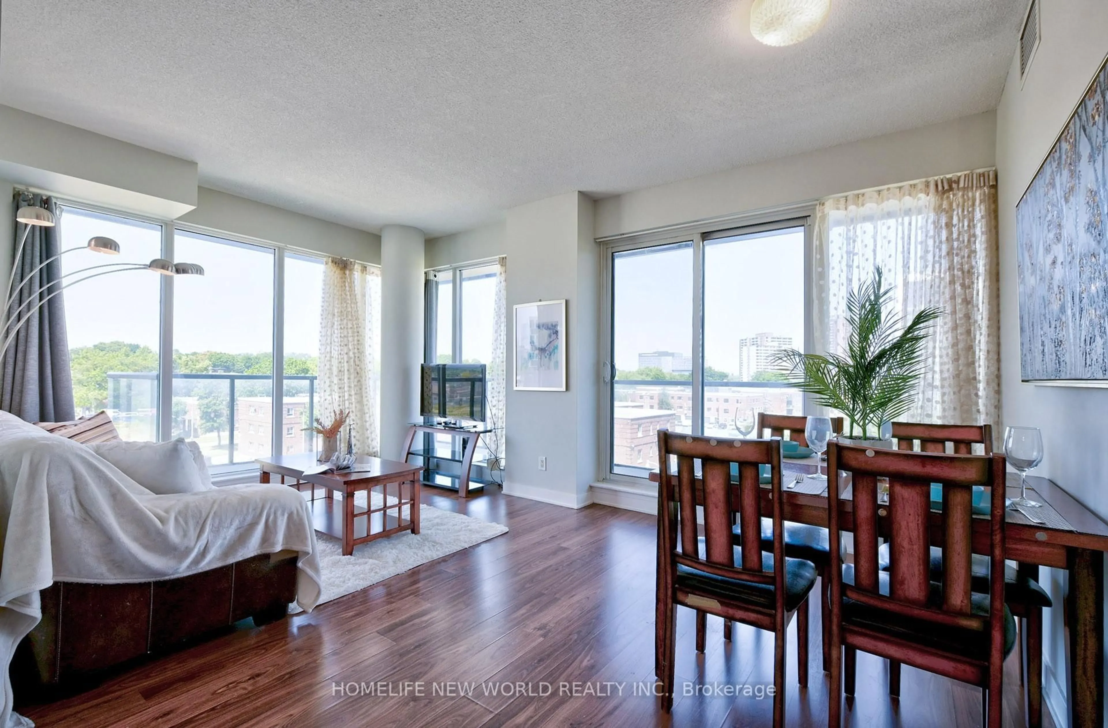 Living room with furniture, wood/laminate floor for 260 Sackville St #505, Toronto Ontario M5A 0B3