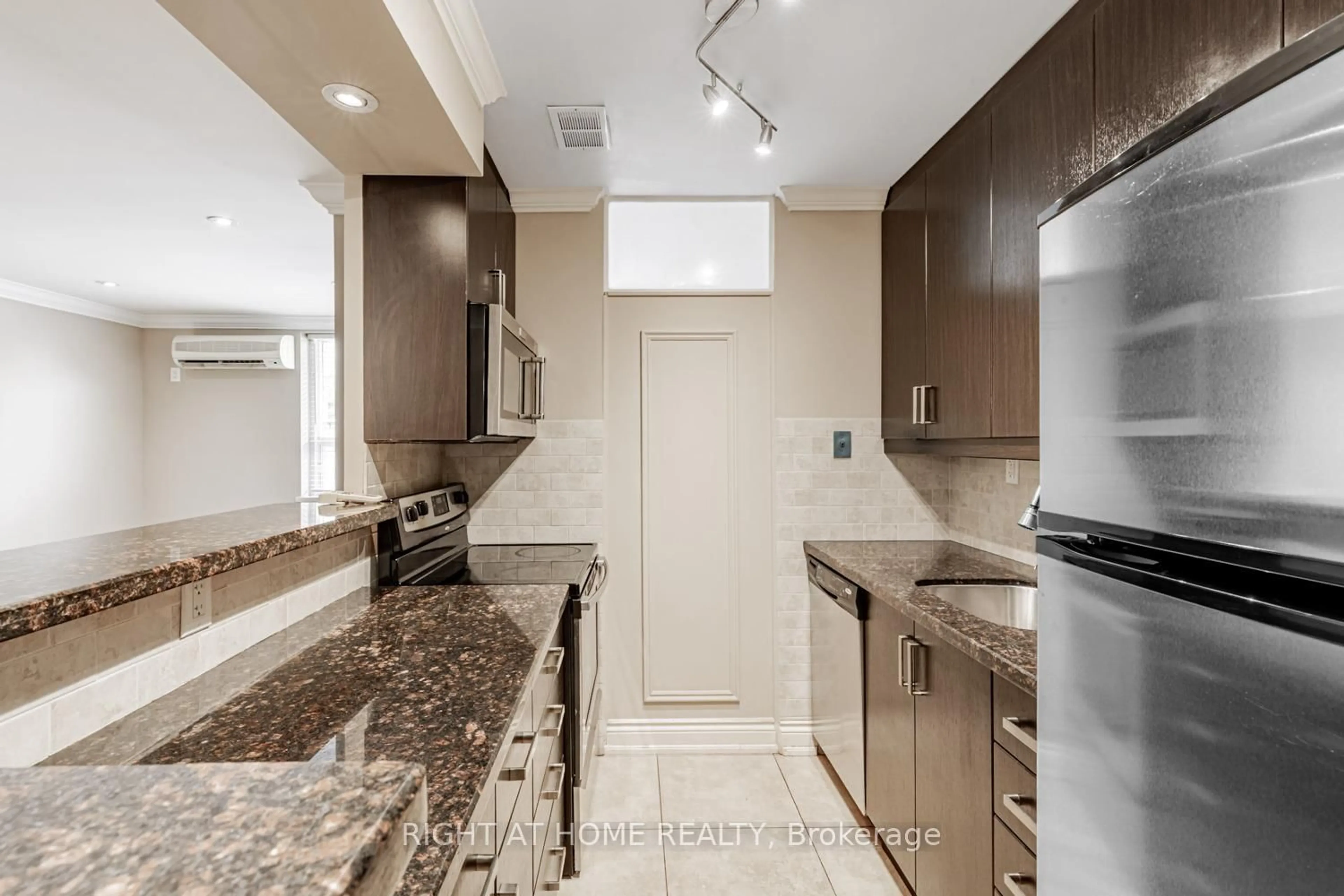 Contemporary kitchen, ceramic/tile floor for 71 Jonesville Cres #104, Toronto Ontario M4A 1H1