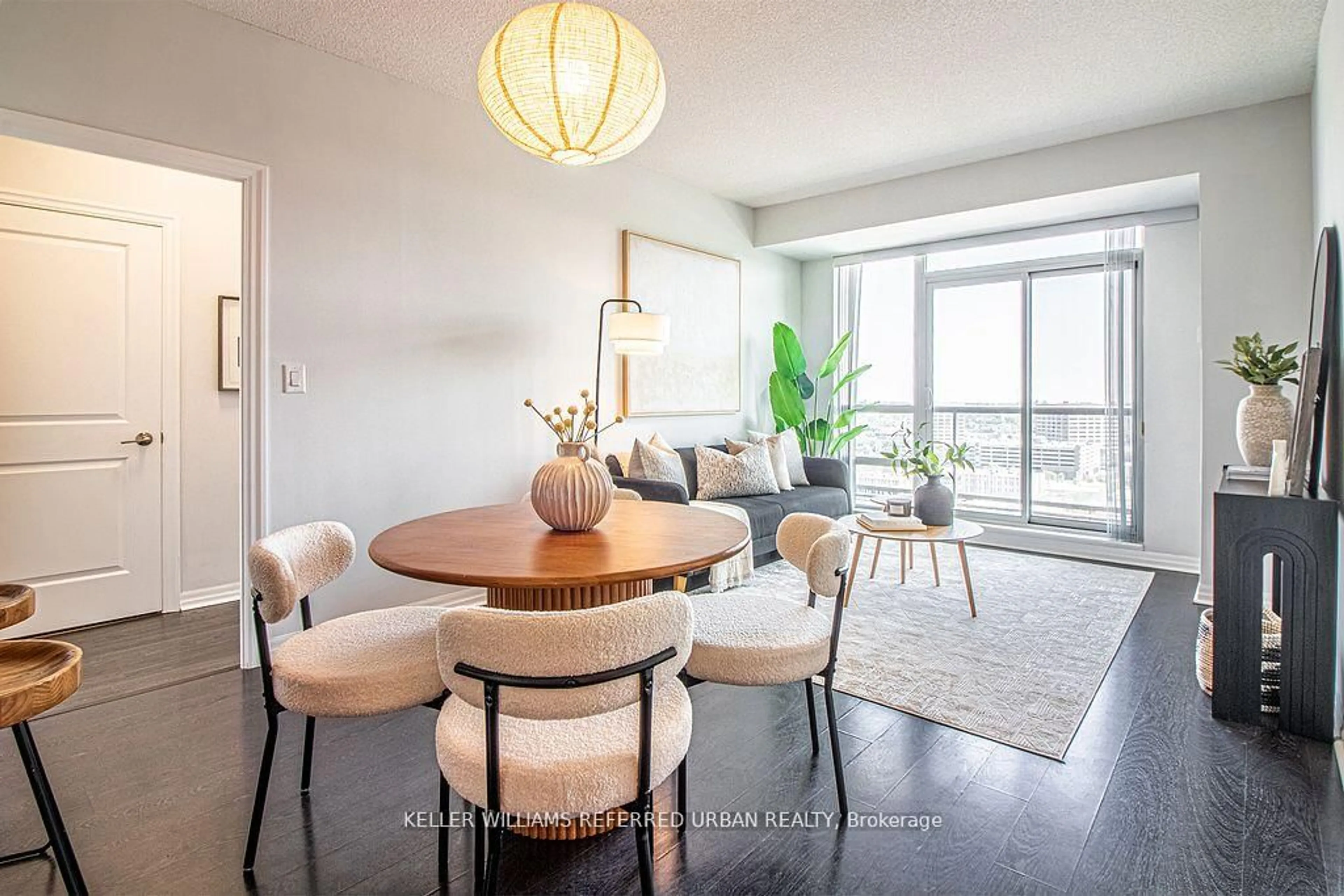 Living room with furniture, wood/laminate floor for 30 Herons Hill Way #2009, Toronto Ontario M2J 0A7