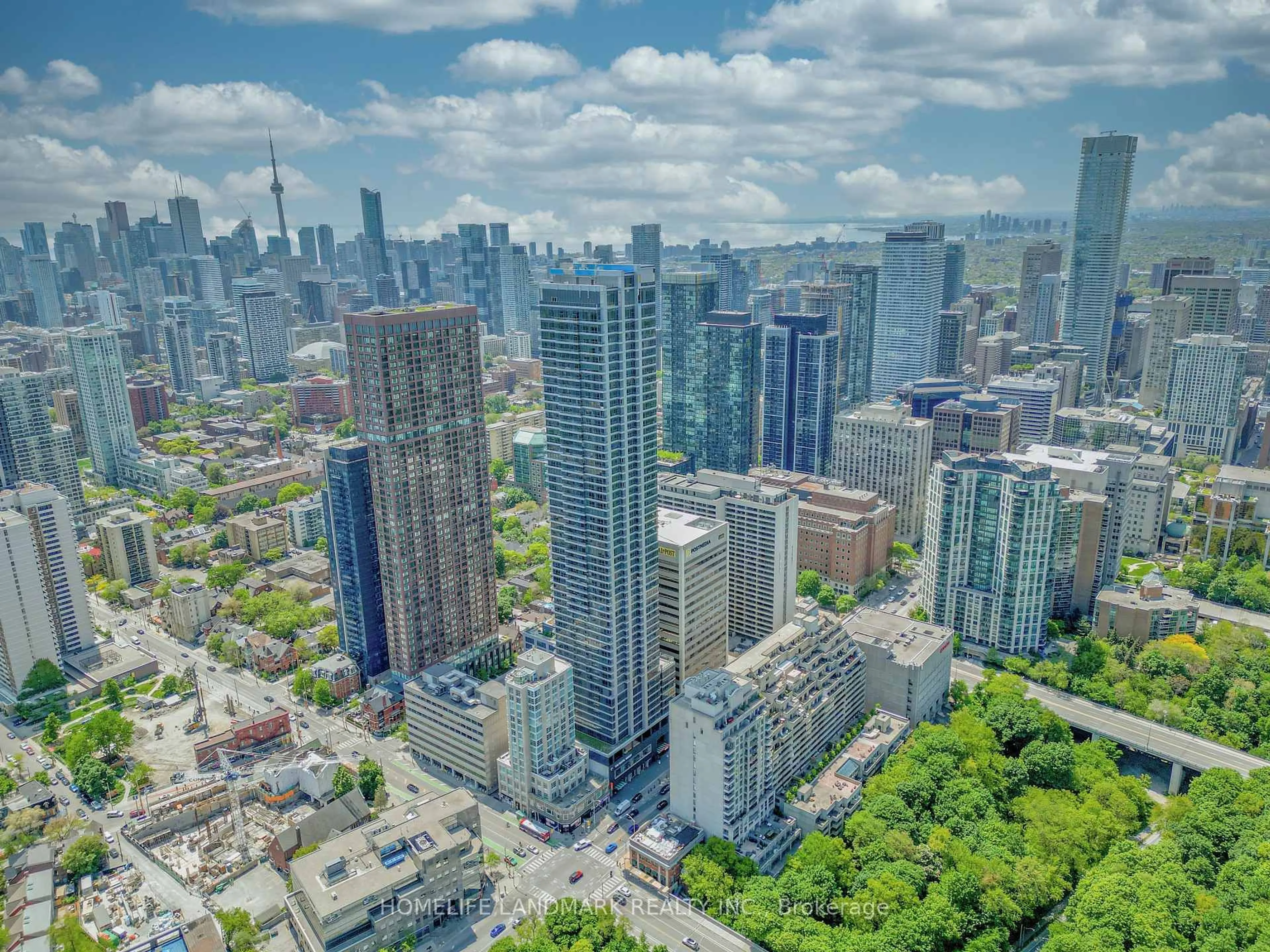 A pic from outside/outdoor area/front of a property/back of a property/a pic from drone, city buildings view from balcony for 395 Bloor St #5511, Toronto Ontario M4W 0B4