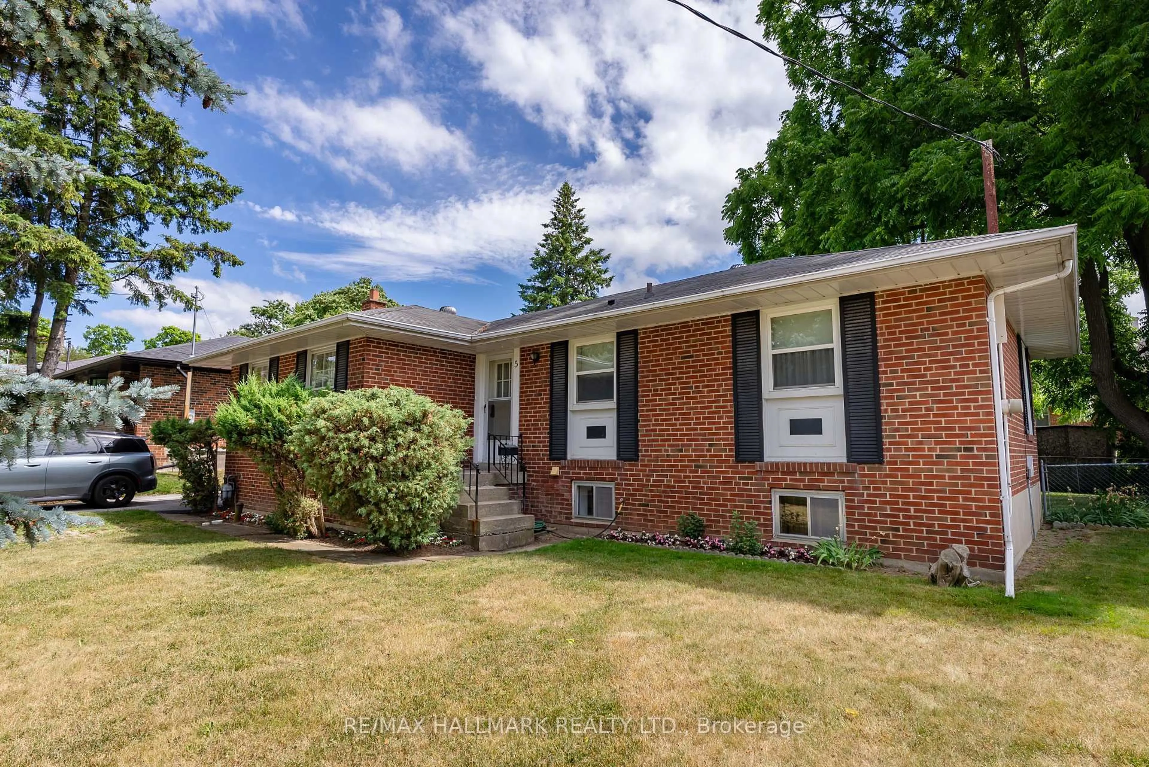 Home with brick exterior material, street for 5 Tinder Cres, Toronto Ontario M4A 1L2