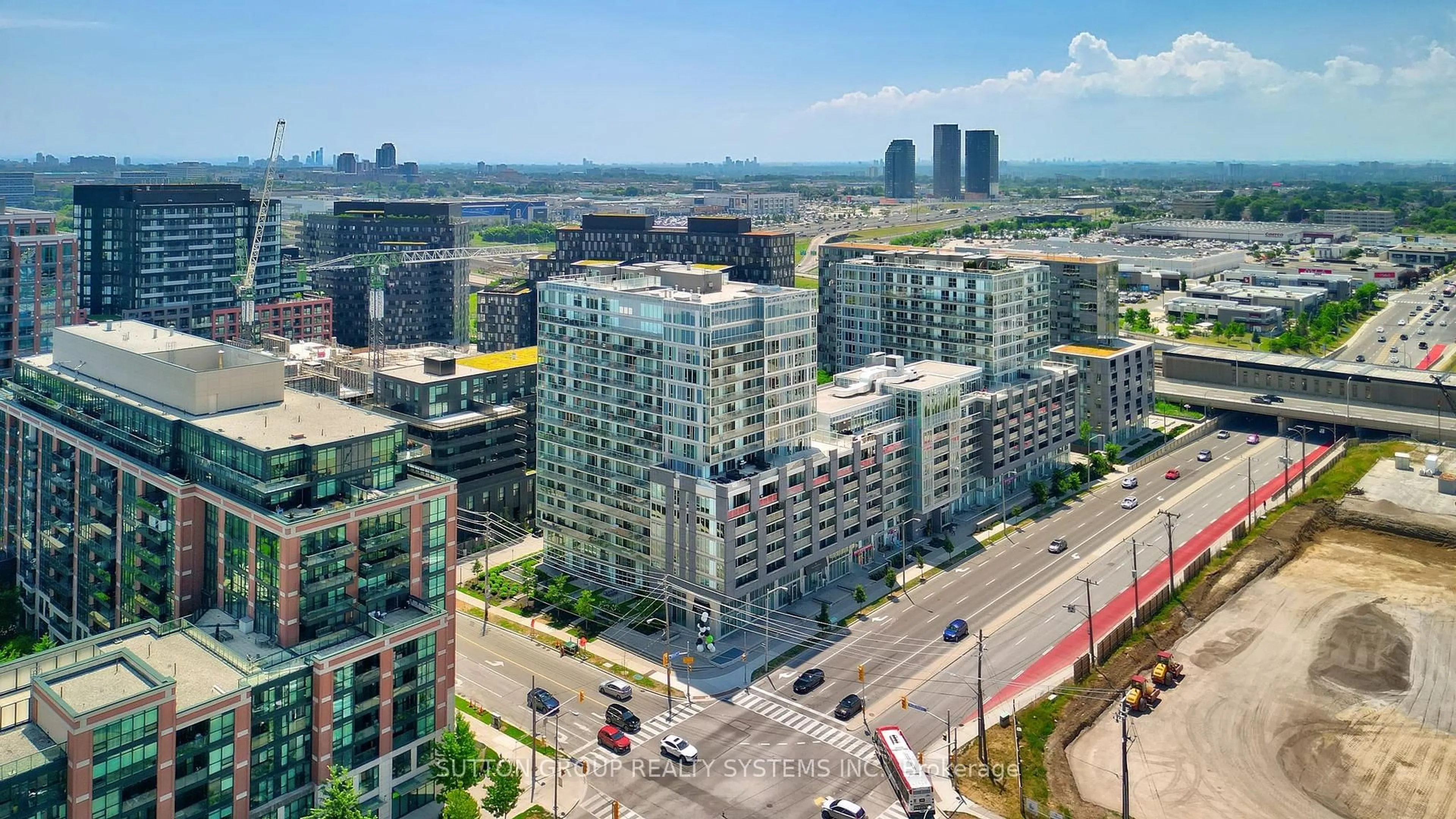 A pic from outside/outdoor area/front of a property/back of a property/a pic from drone, city buildings view from balcony for 565 Wilson Ave #421, Toronto Ontario M3H 0C6