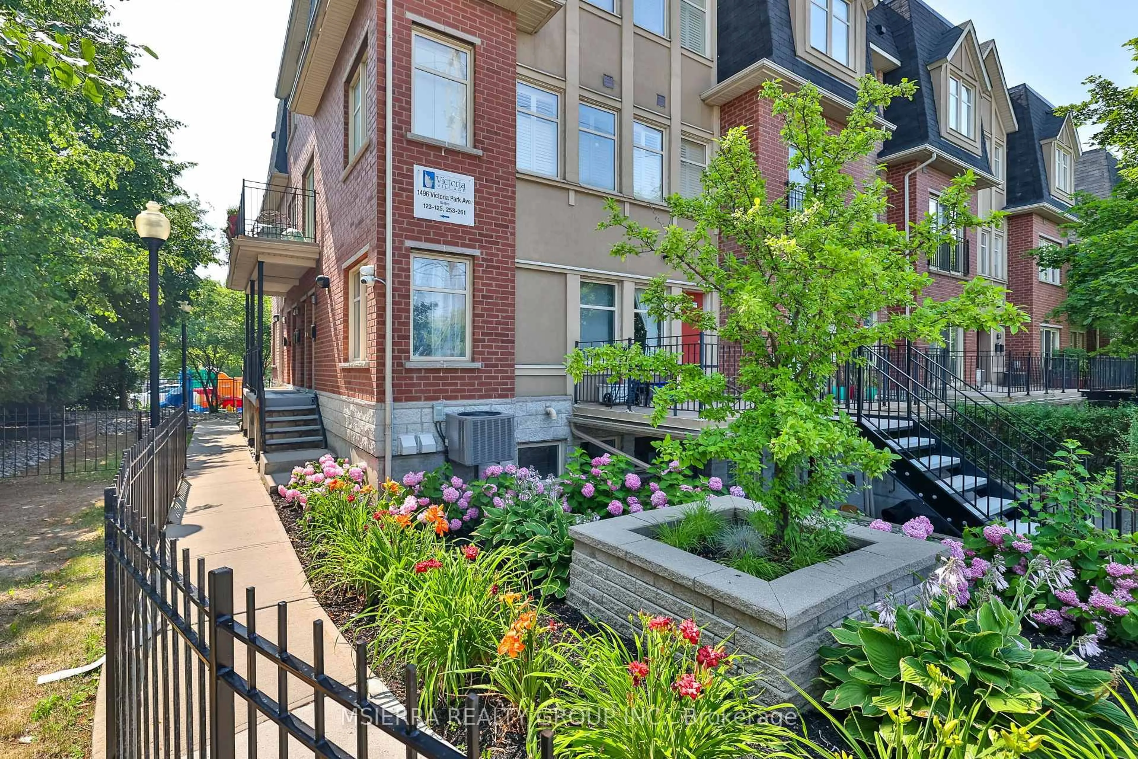 Home with brick exterior material, street for 1496 Victoria Park Ave #254, Toronto Ontario M4A 2M6