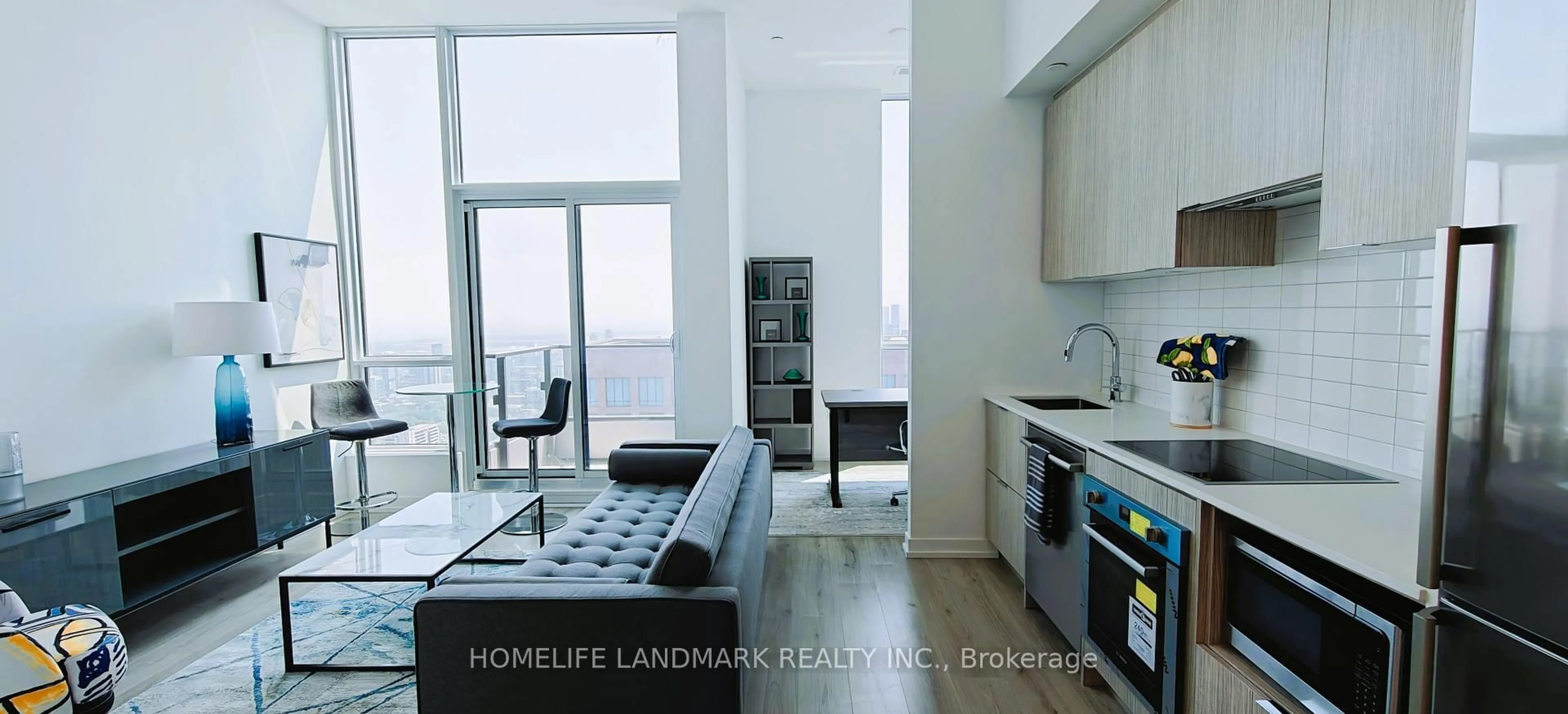 Kitchen with laundary machines, unknown for 395 Bloor St #5501, Toronto Ontario M4W 0B4