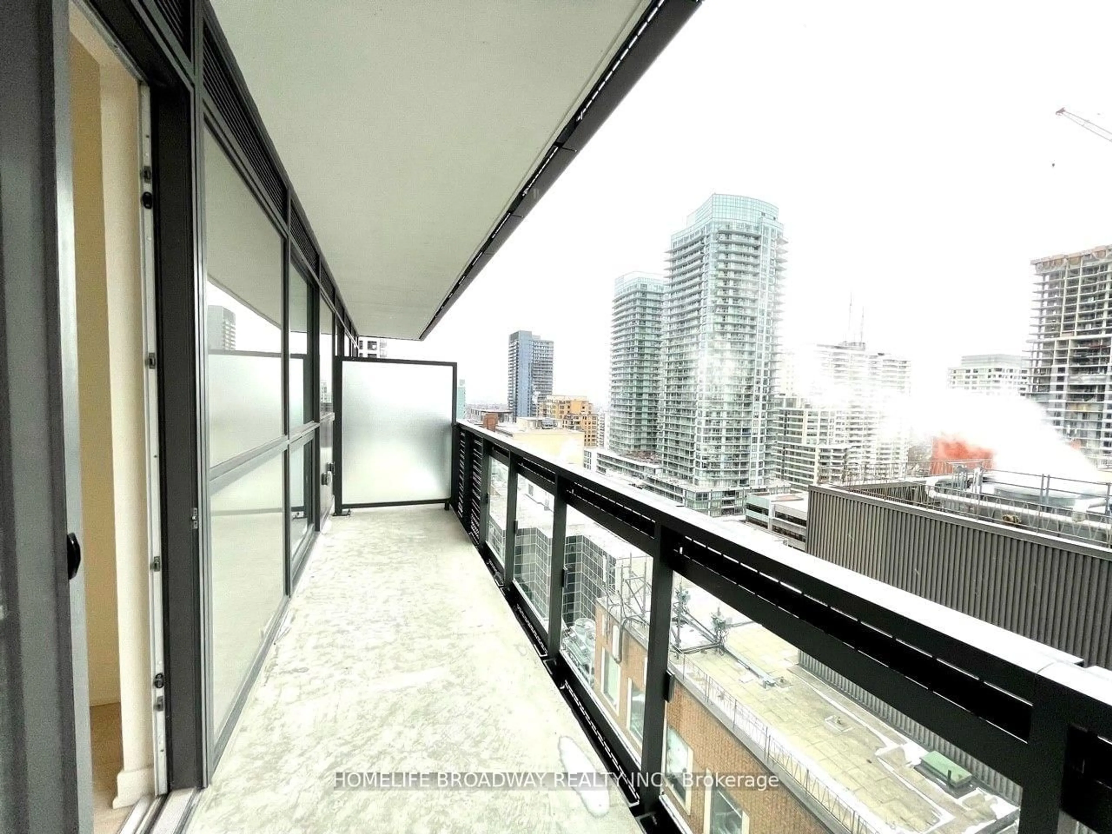Balcony in the apartment, city buildings view from balcony for 39 Roehampton Ave #1504, Toronto Ontario M4P 0G1