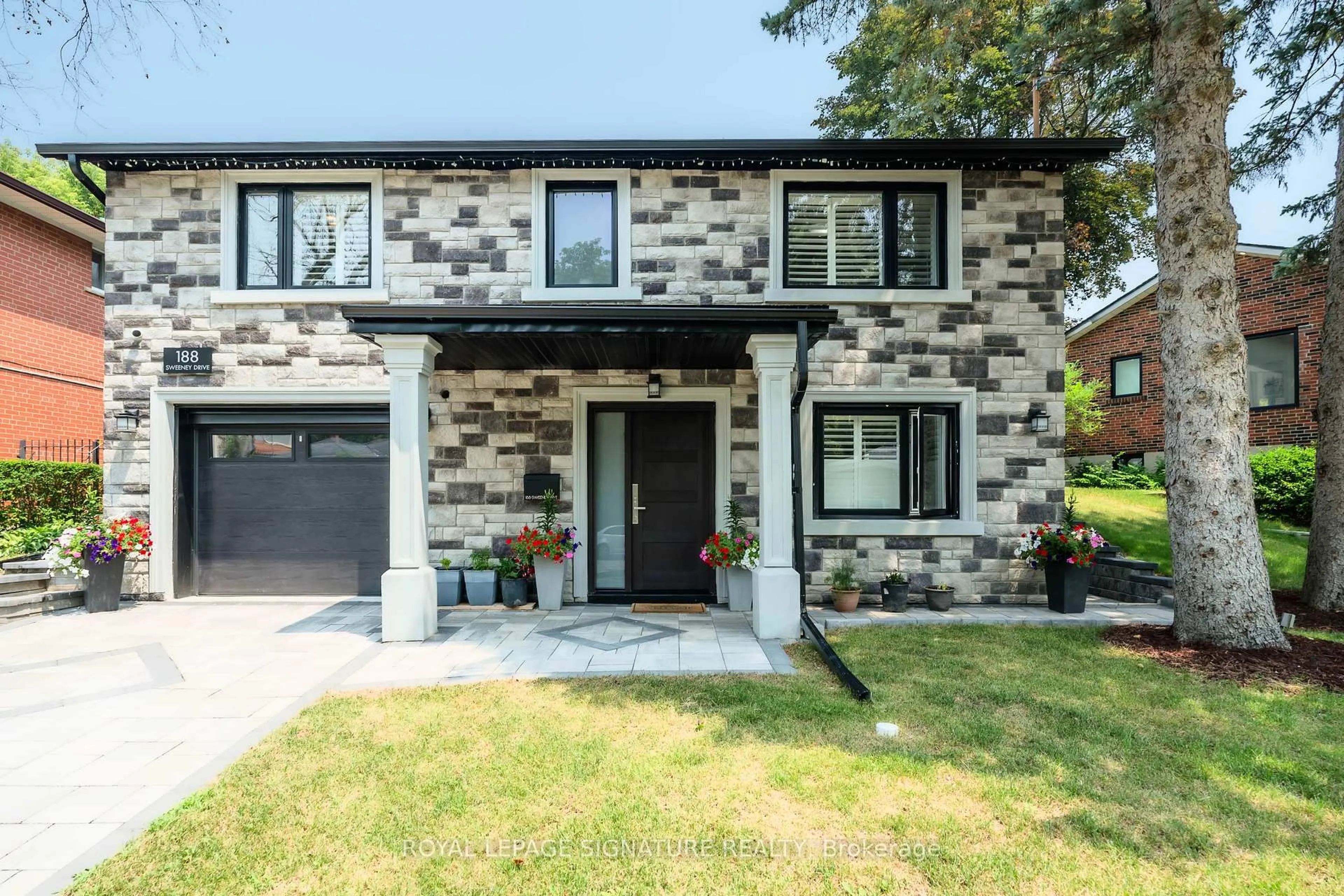 Home with brick exterior material, street for 188 Sweeney Dr, Toronto Ontario M4A 1V4