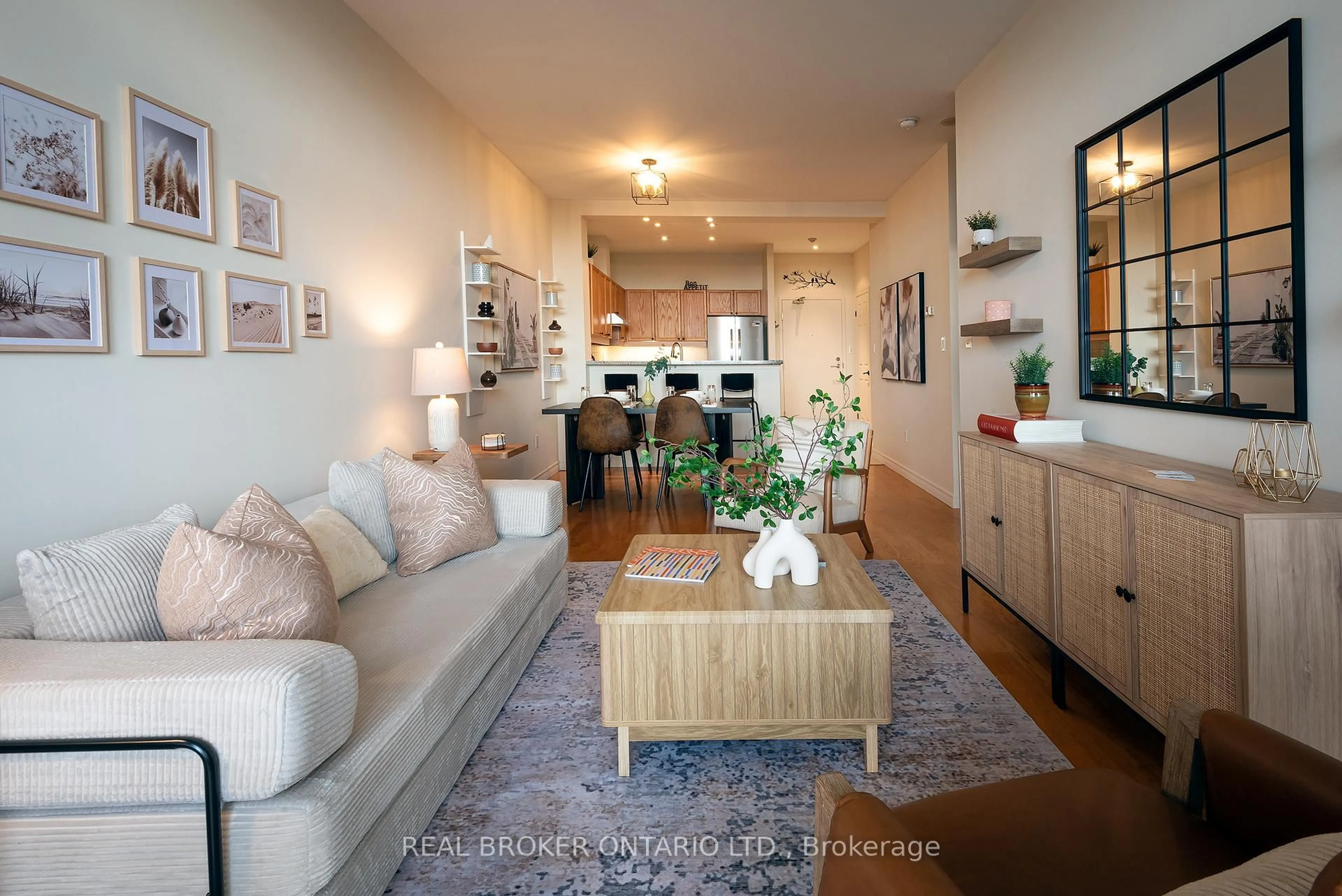 Living room with furniture, wood/laminate floor for 1 Leaside Park Dr #404, Toronto Ontario M4H 1R1