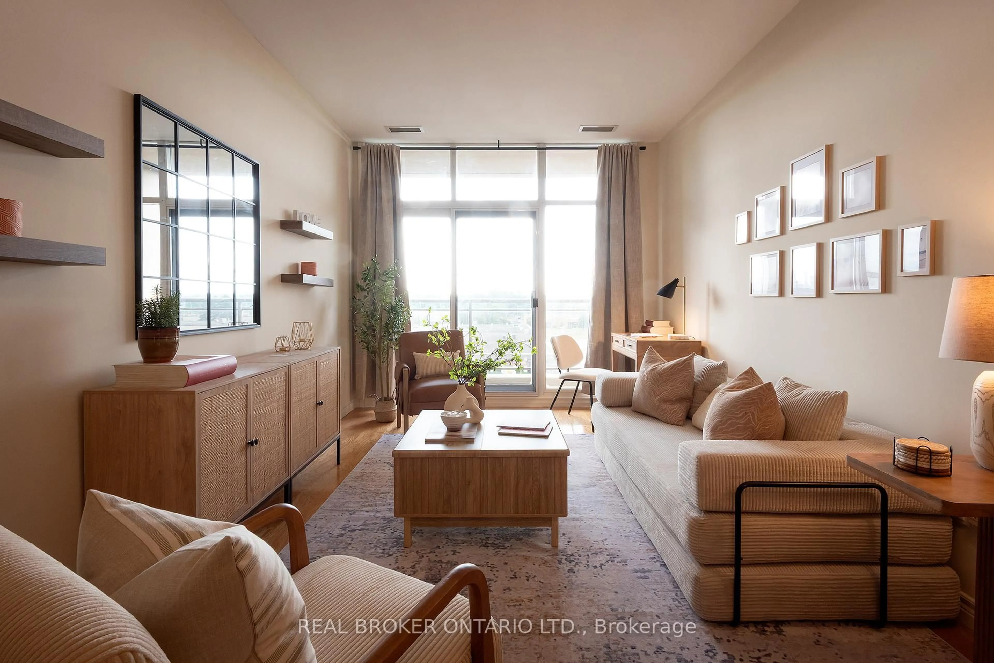 Living room with furniture, wood/laminate floor for 1 Leaside Park Dr #404, Toronto Ontario M4H 1R1