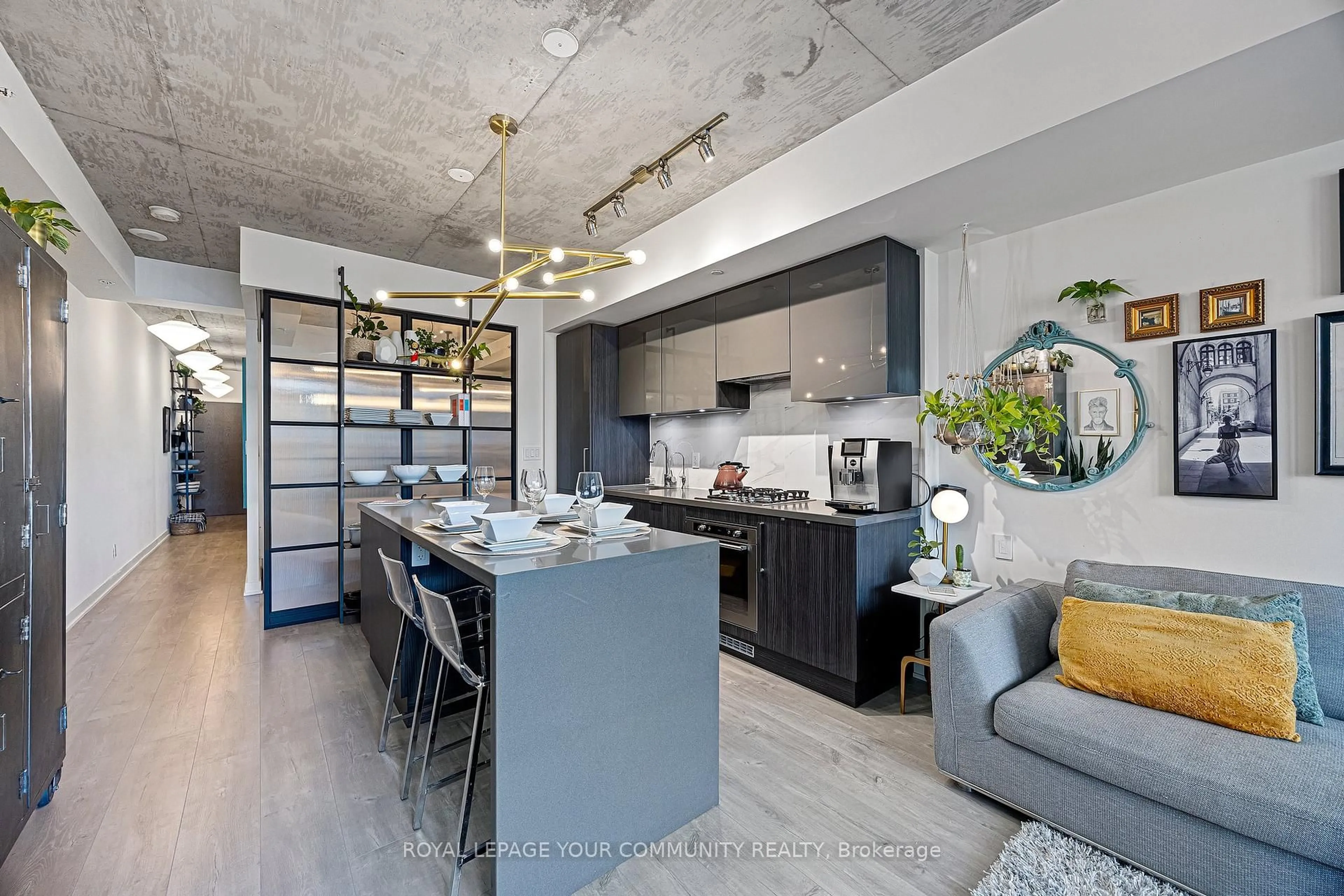 Open concept kitchen, cement floor for 109 Ossington Ave #216, Toronto Ontario M6J 0G1