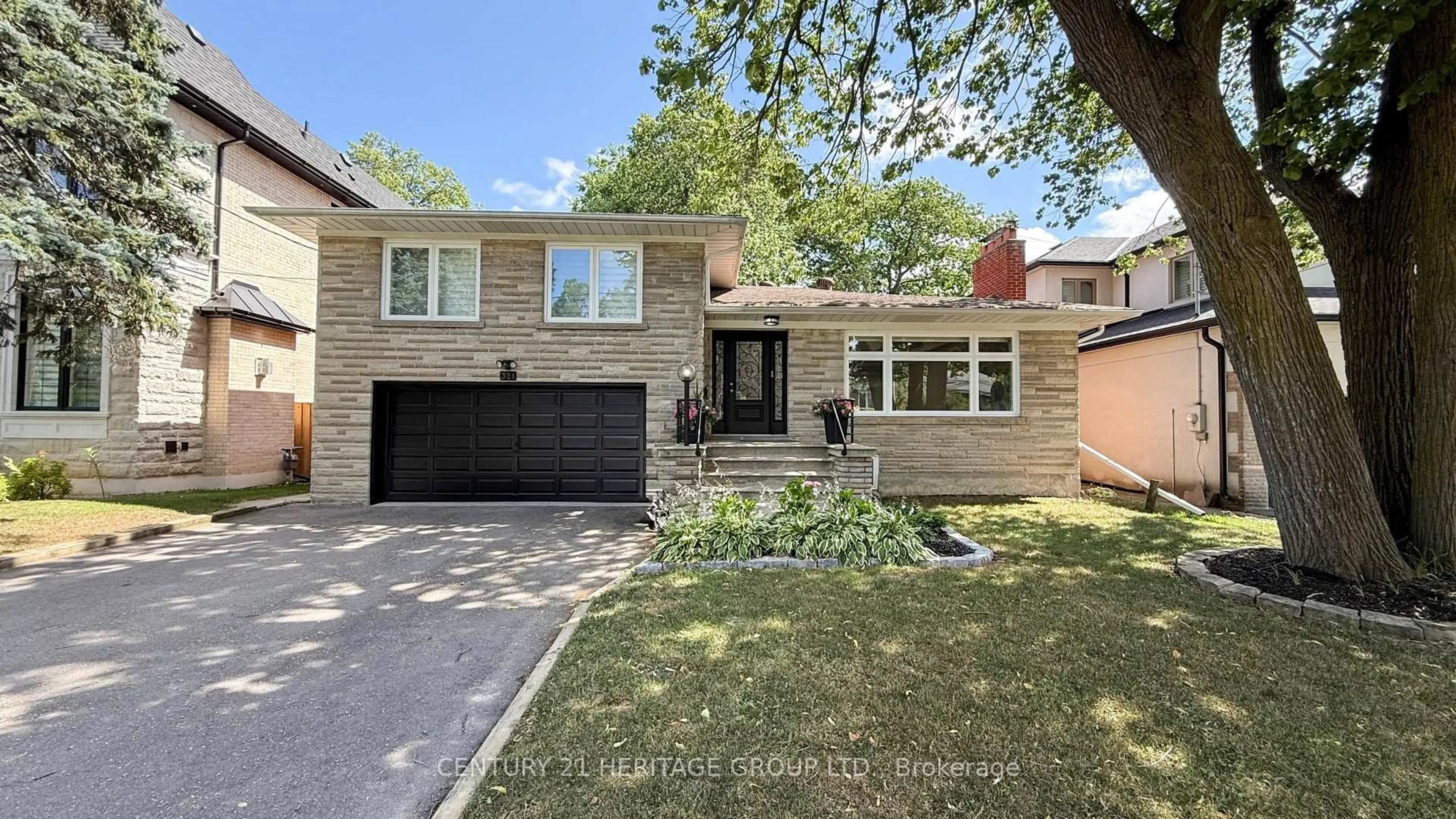 Home with brick exterior material, street for 321 Betty Ann Dr, Toronto Ontario M2R 1B4