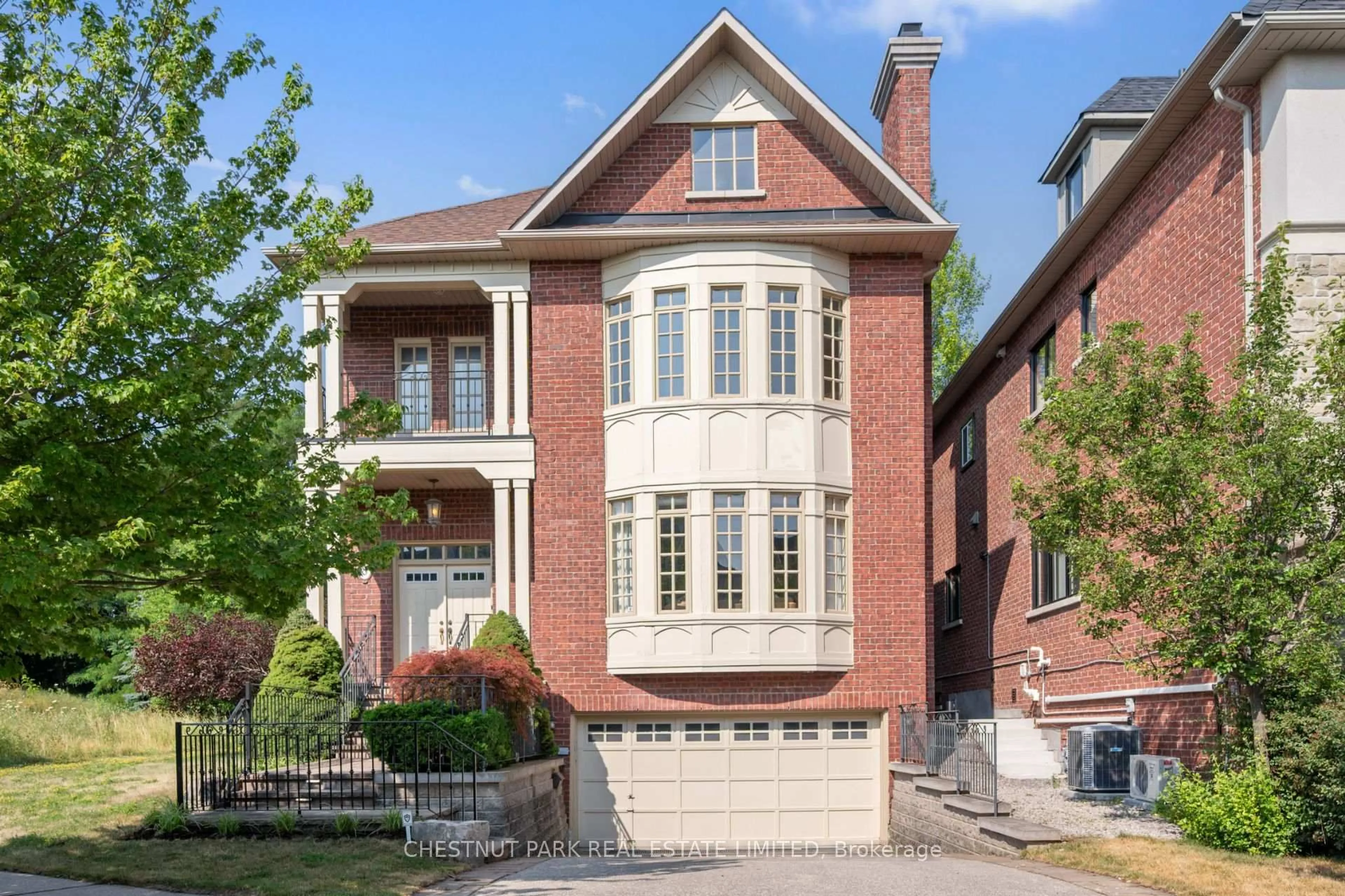 Home with brick exterior material, street for 8 True Davidson Dr, Toronto Ontario M4W 3X5