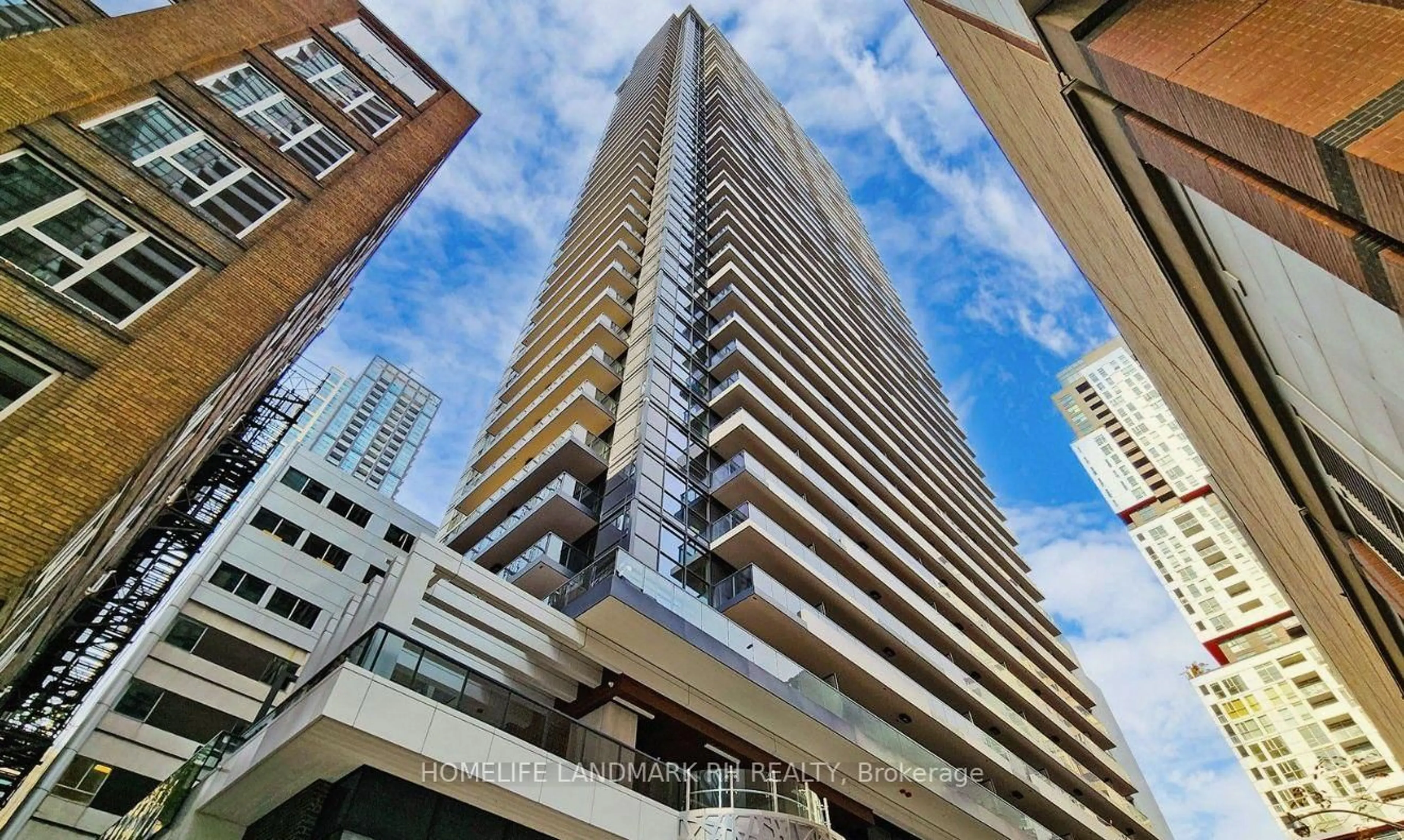 A pic from outside/outdoor area/front of a property/back of a property/a pic from drone, building for 38 Widmer St #706, Toronto Ontario M5V 0P7