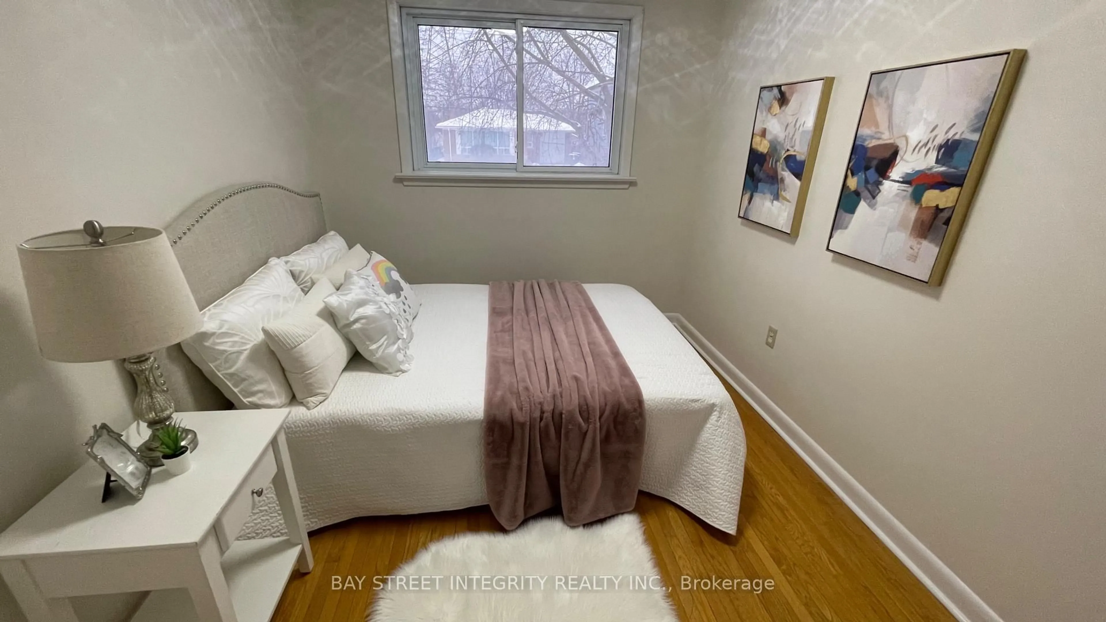 Bedroom with bed, wood/laminate floor for 44 Bowerbank Dr, Toronto Ontario M2M 1Z8