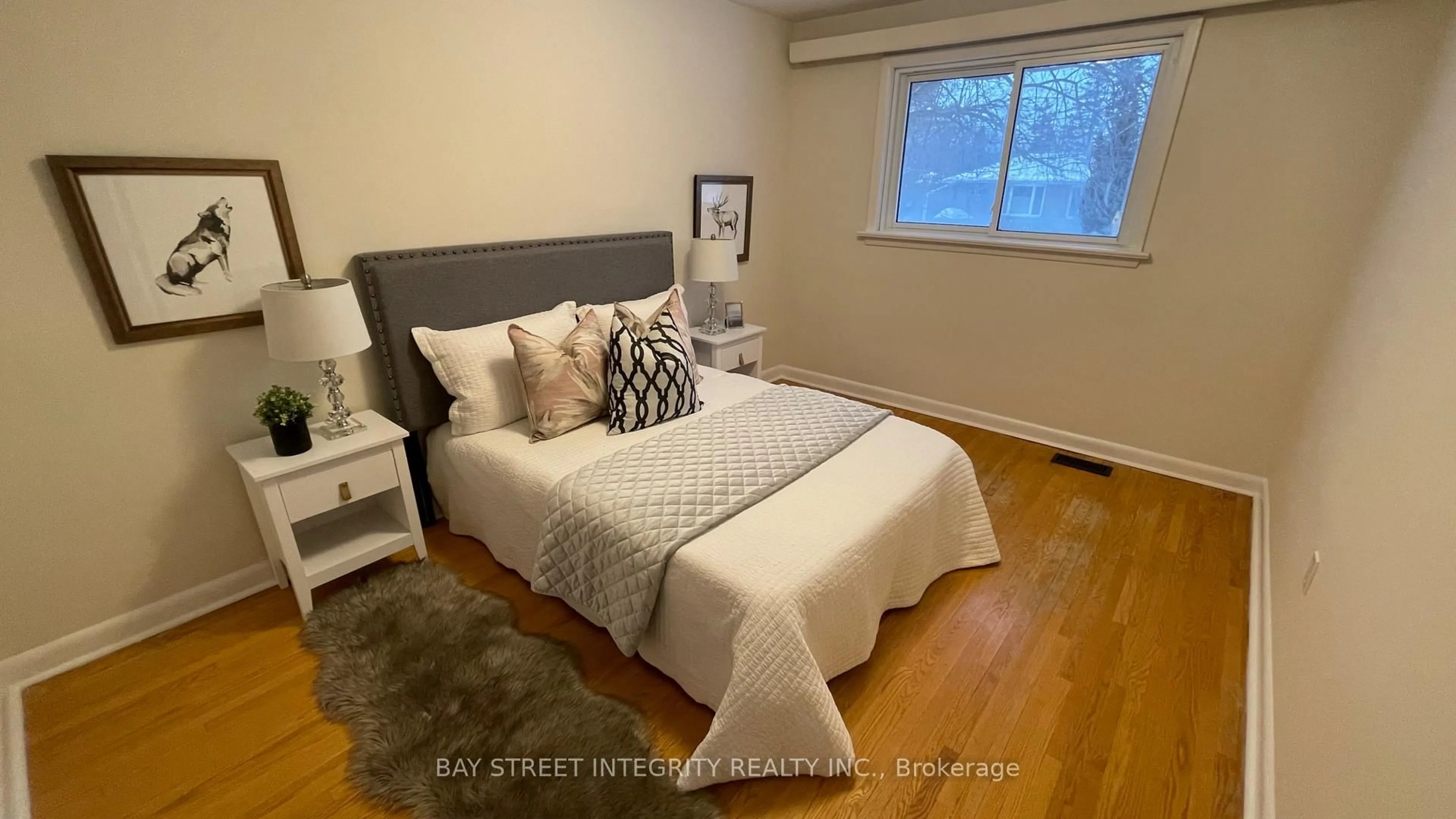 Bedroom with bed, wood/laminate floor for 44 Bowerbank Dr, Toronto Ontario M2M 1Z8