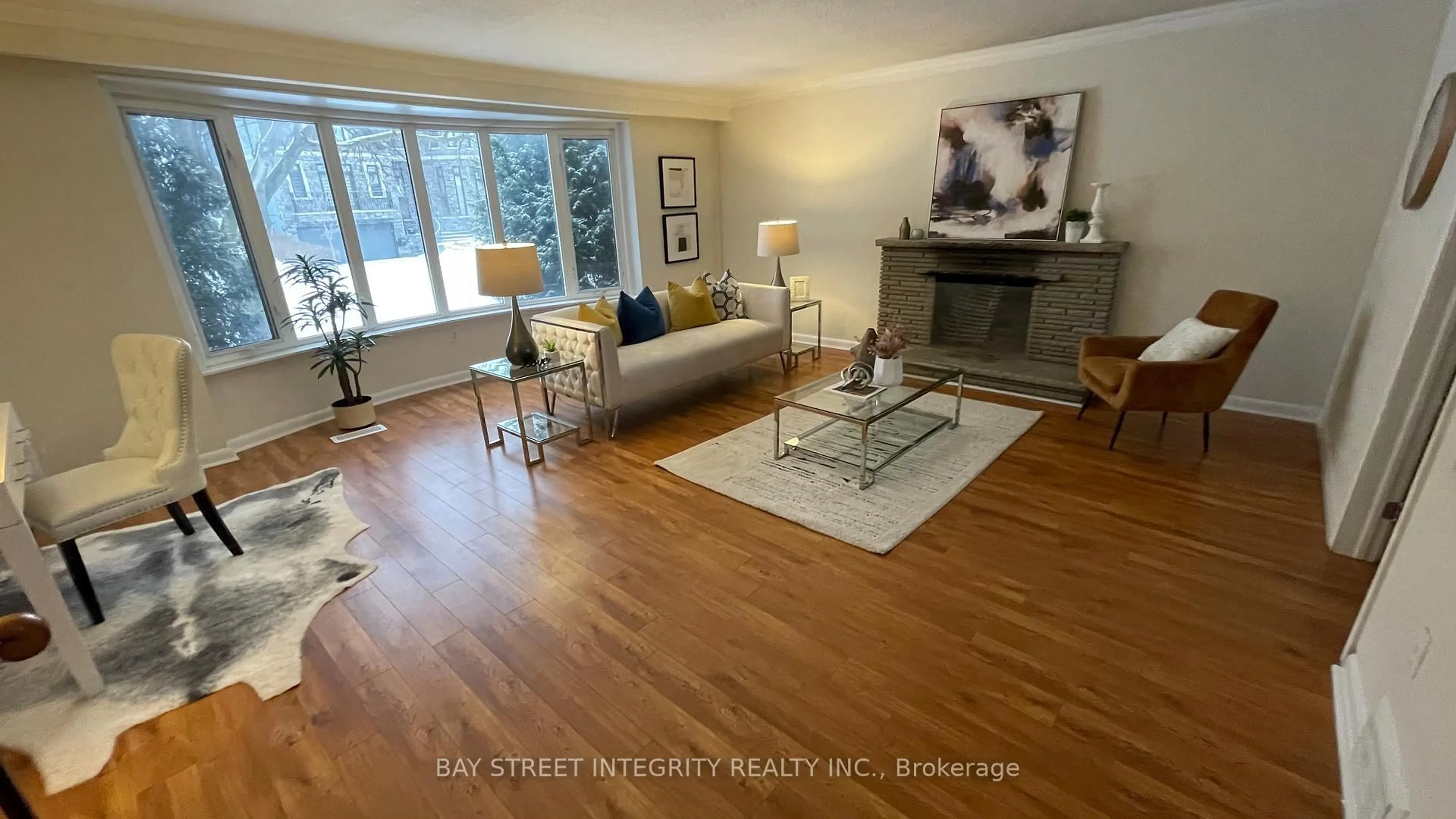 Living room with furniture, wood/laminate floor for 44 Bowerbank Dr, Toronto Ontario M2M 1Z8