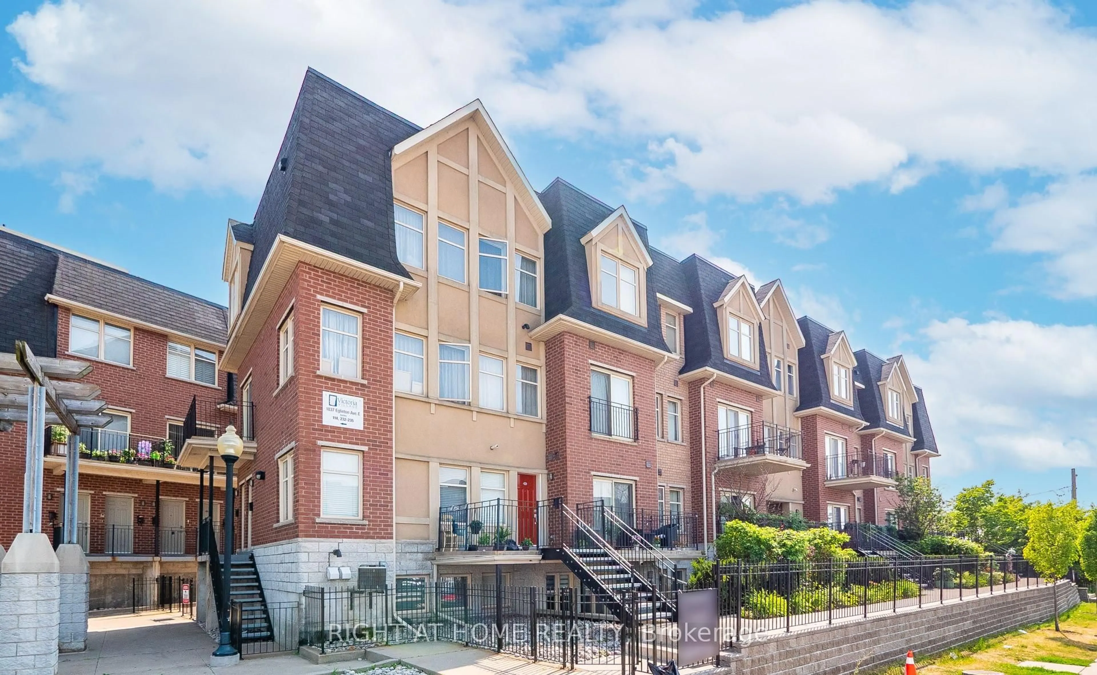 Home with brick exterior material, street for 1837 Eglinton Ave #113, Toronto Ontario M4A 2Y4