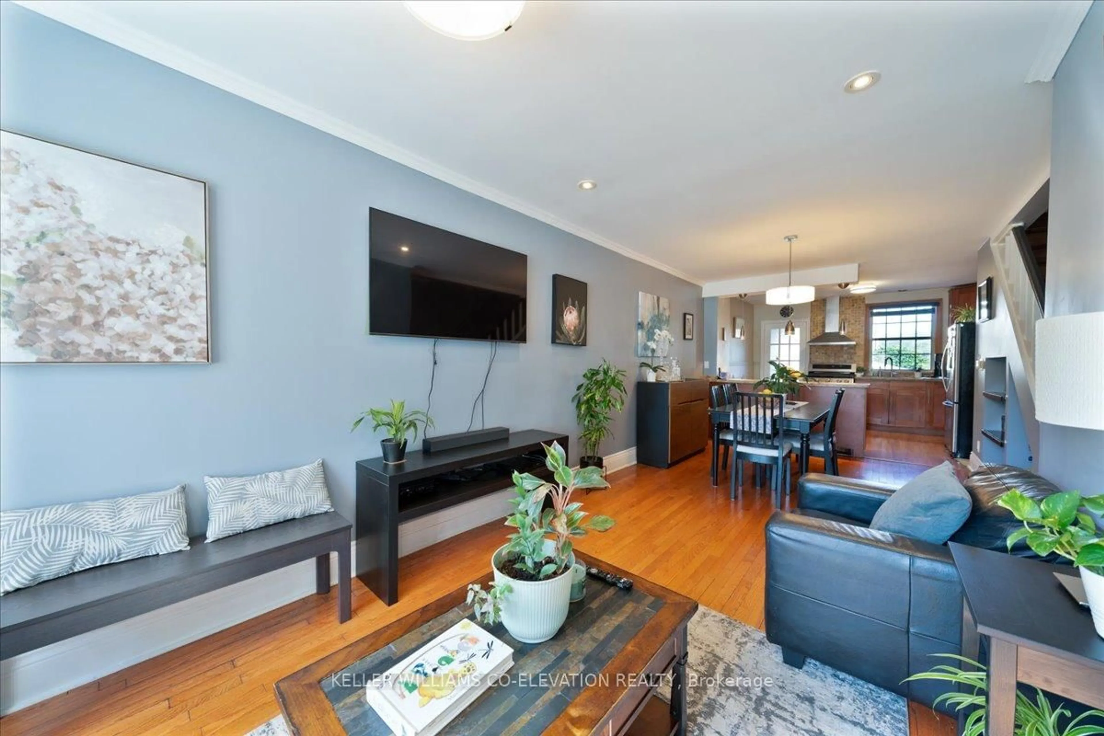 Living room with furniture, wood/laminate floor for 638 Winona Dr, Toronto Ontario M6C 3V6