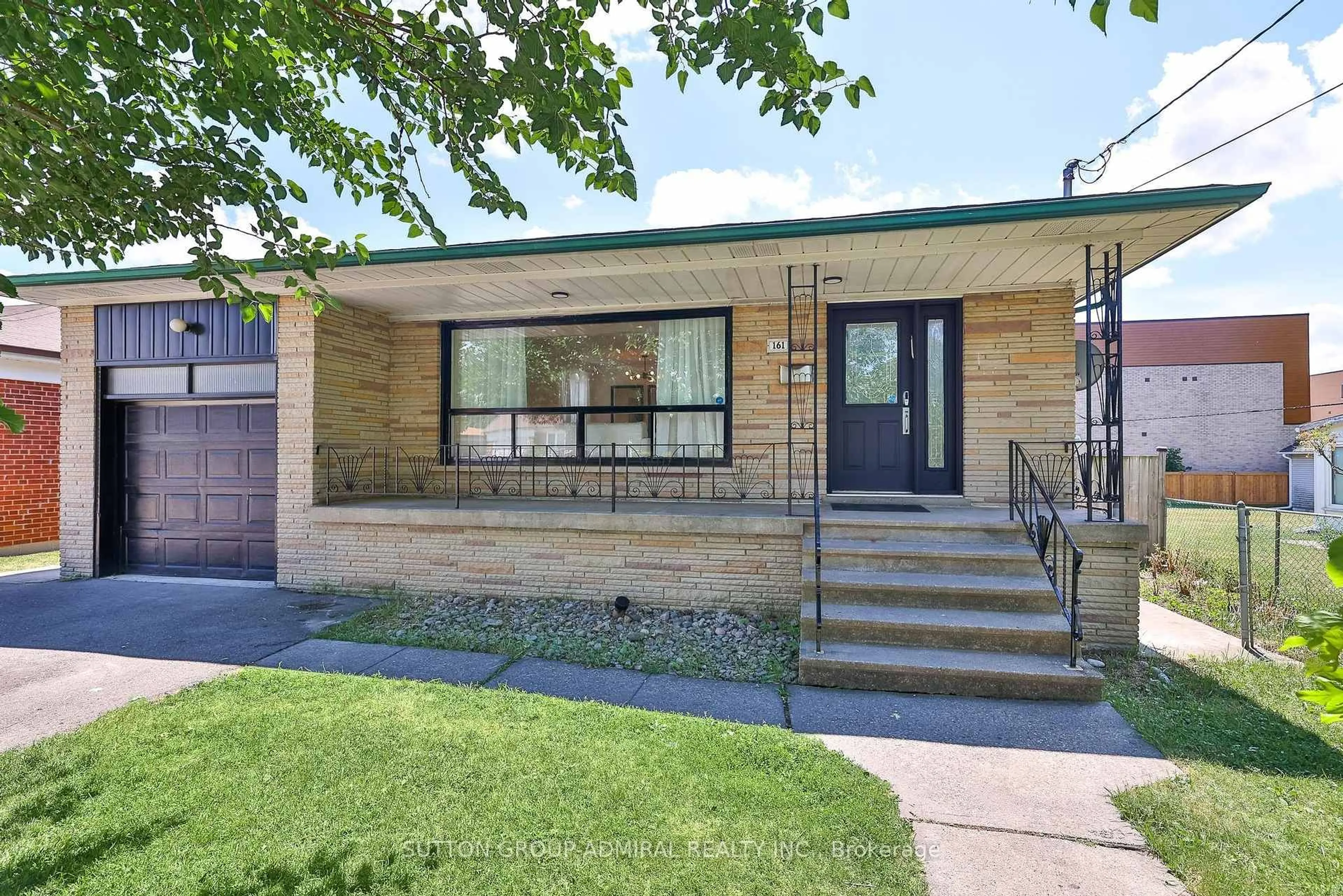 Home with brick exterior material, street for 161 Ranee Ave, Toronto Ontario M6A 1N3