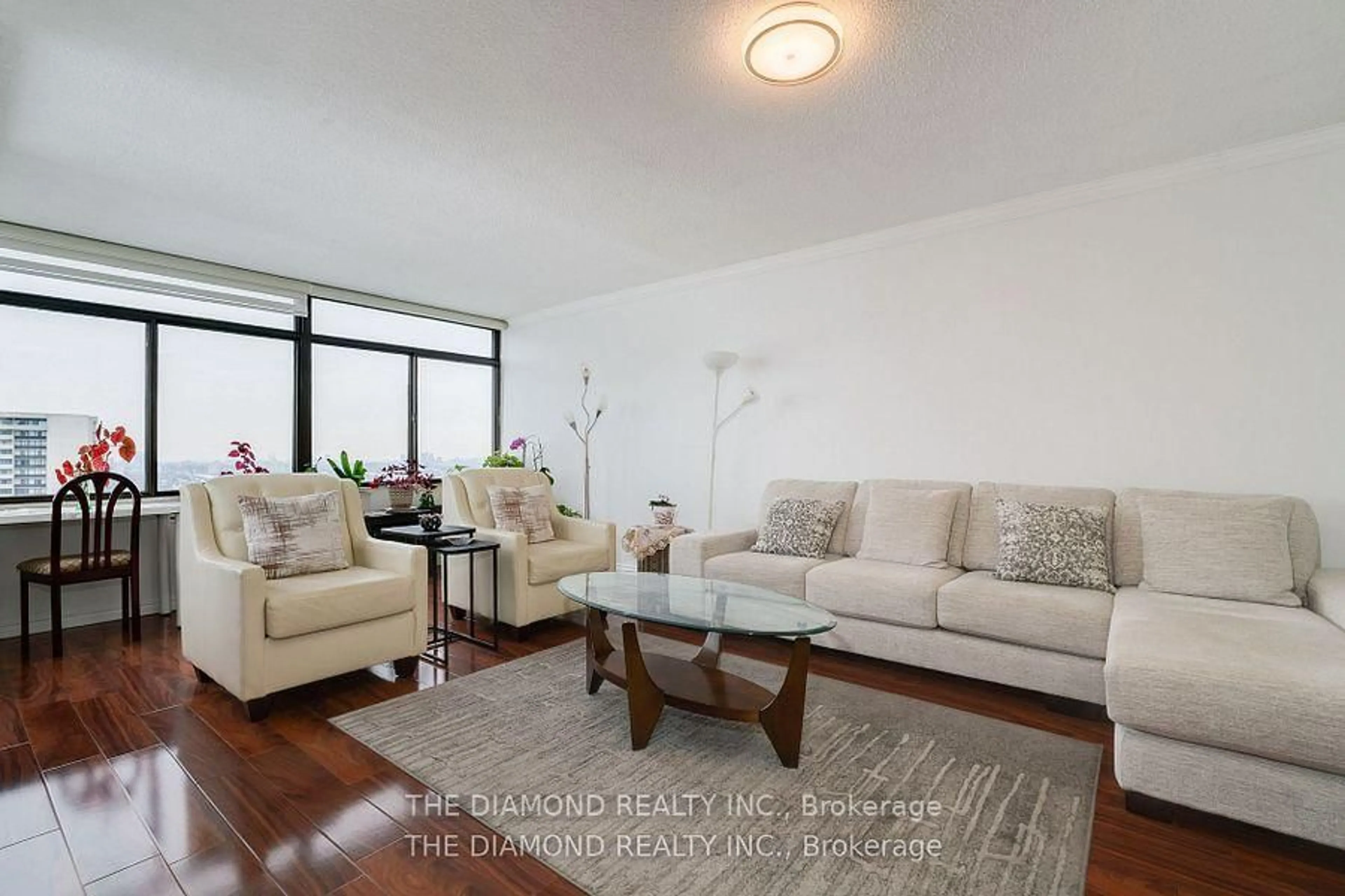 Living room with furniture, wood/laminate floor for 1555 Finch Ave #2207, Toronto Ontario M2J 4X9