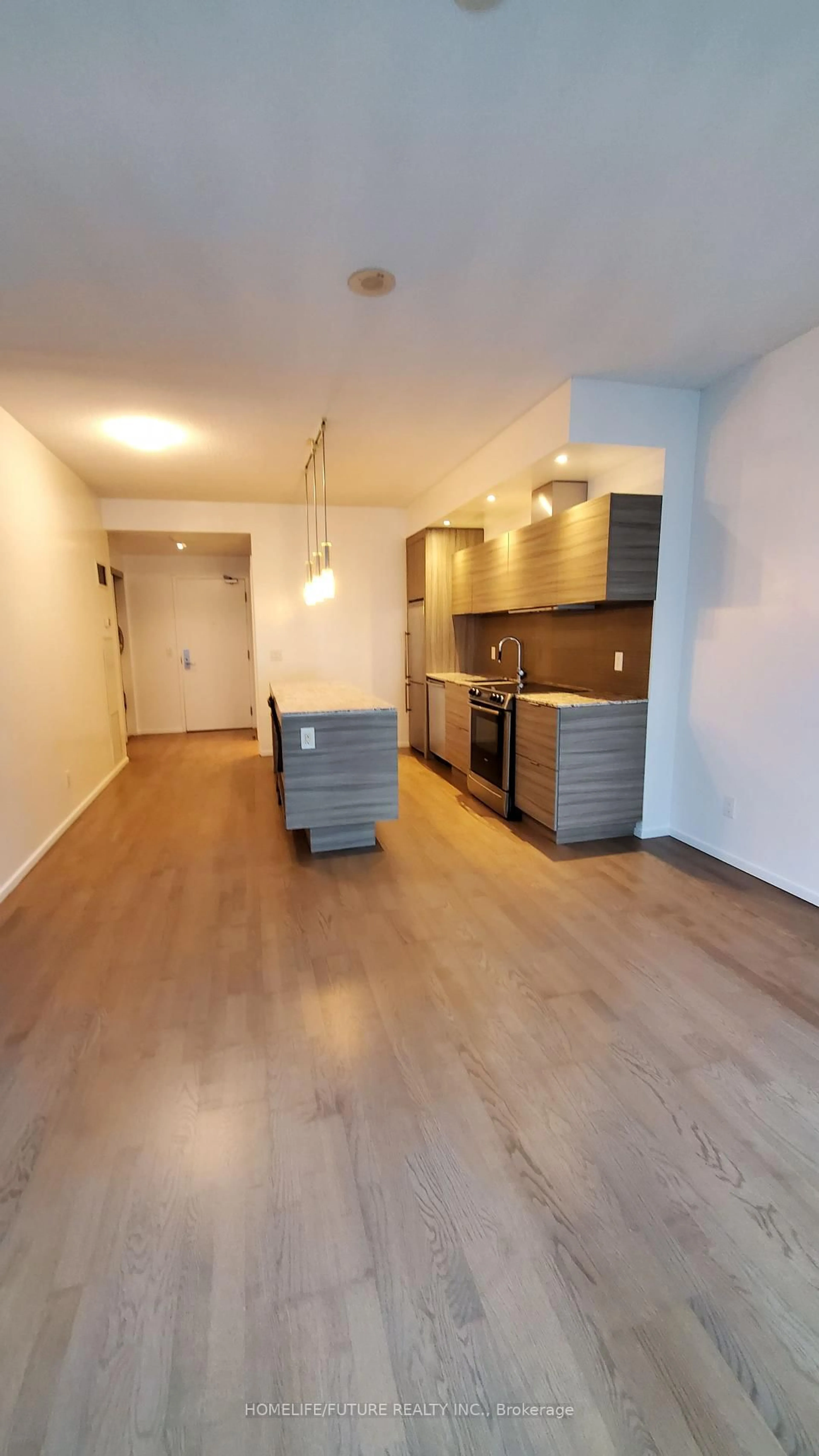 Open concept kitchen, wood/laminate floor for 8 Charlotte St #2505, Toronto Ontario M5V 0K4