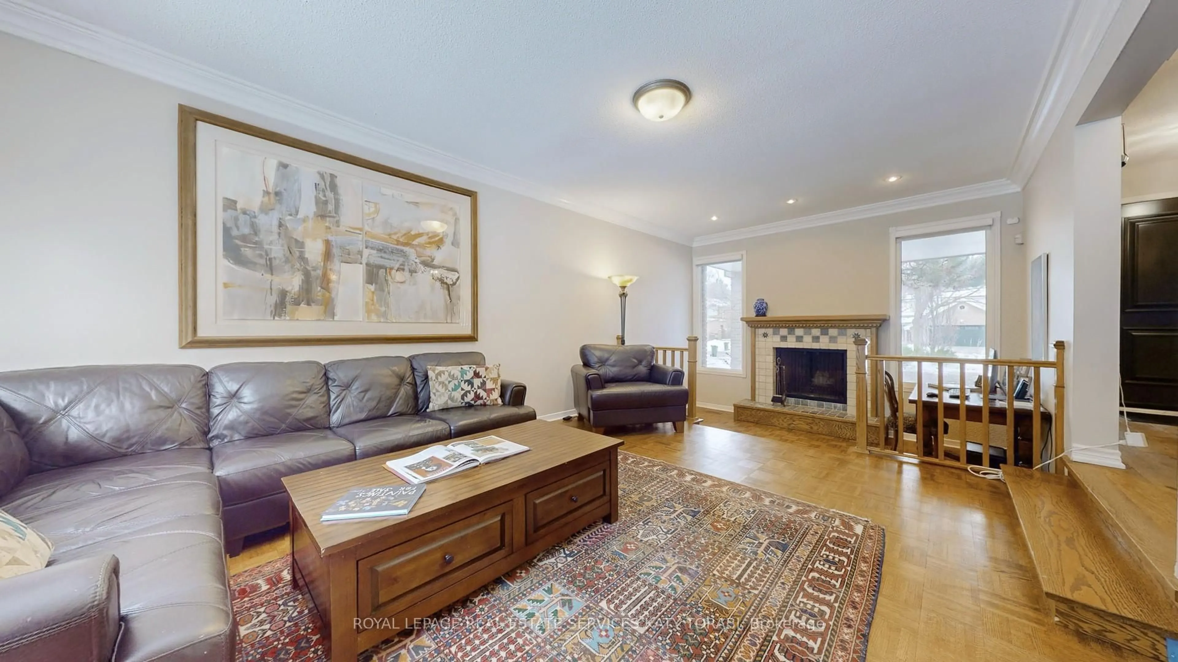 Living room with furniture, wood/laminate floor for 52 Leacock Cres, Toronto Ontario M3B 1P1