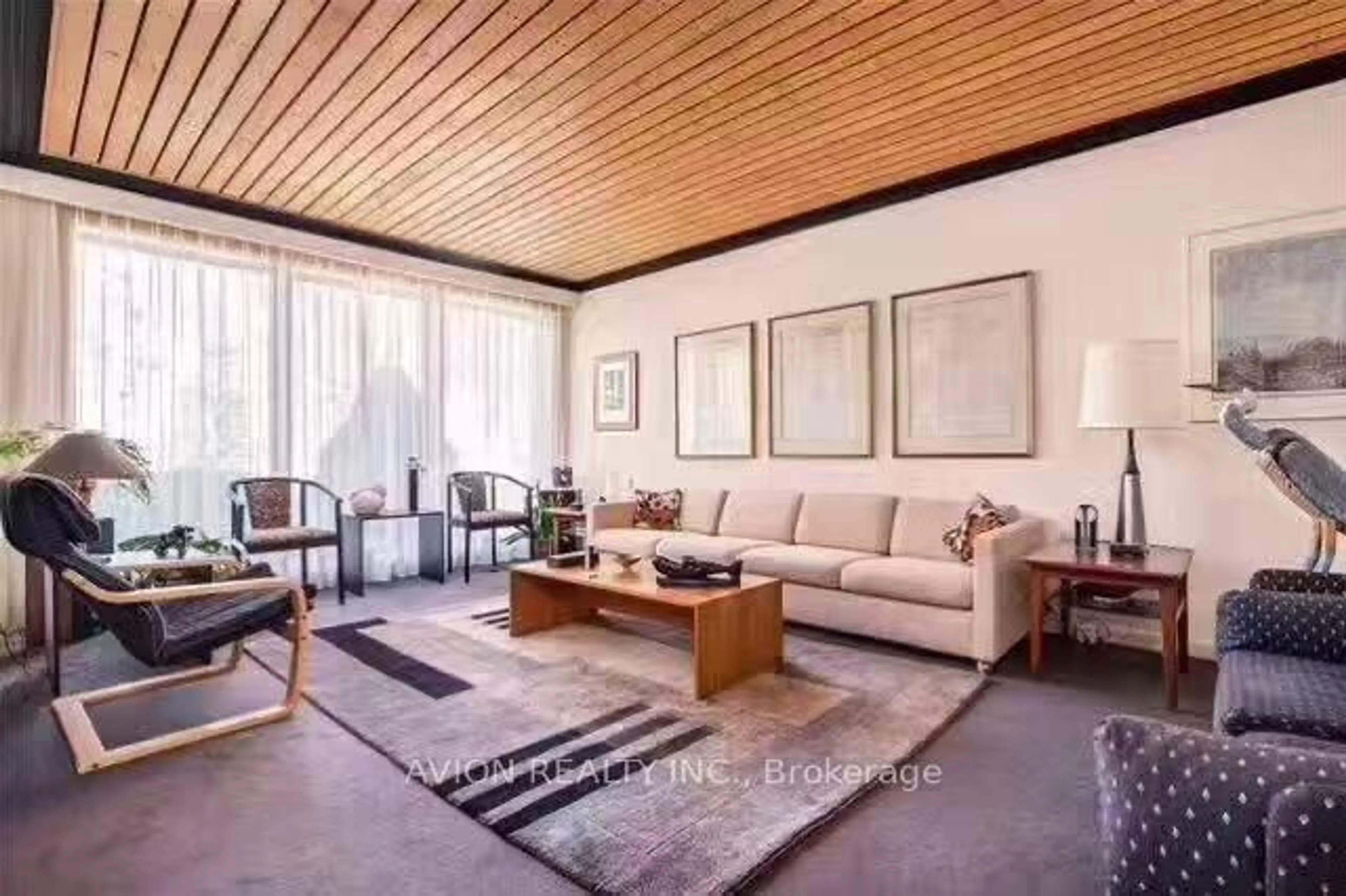 Living room with furniture, wood/laminate floor for 215 Dunview Ave, Toronto Ontario M2N 4H9