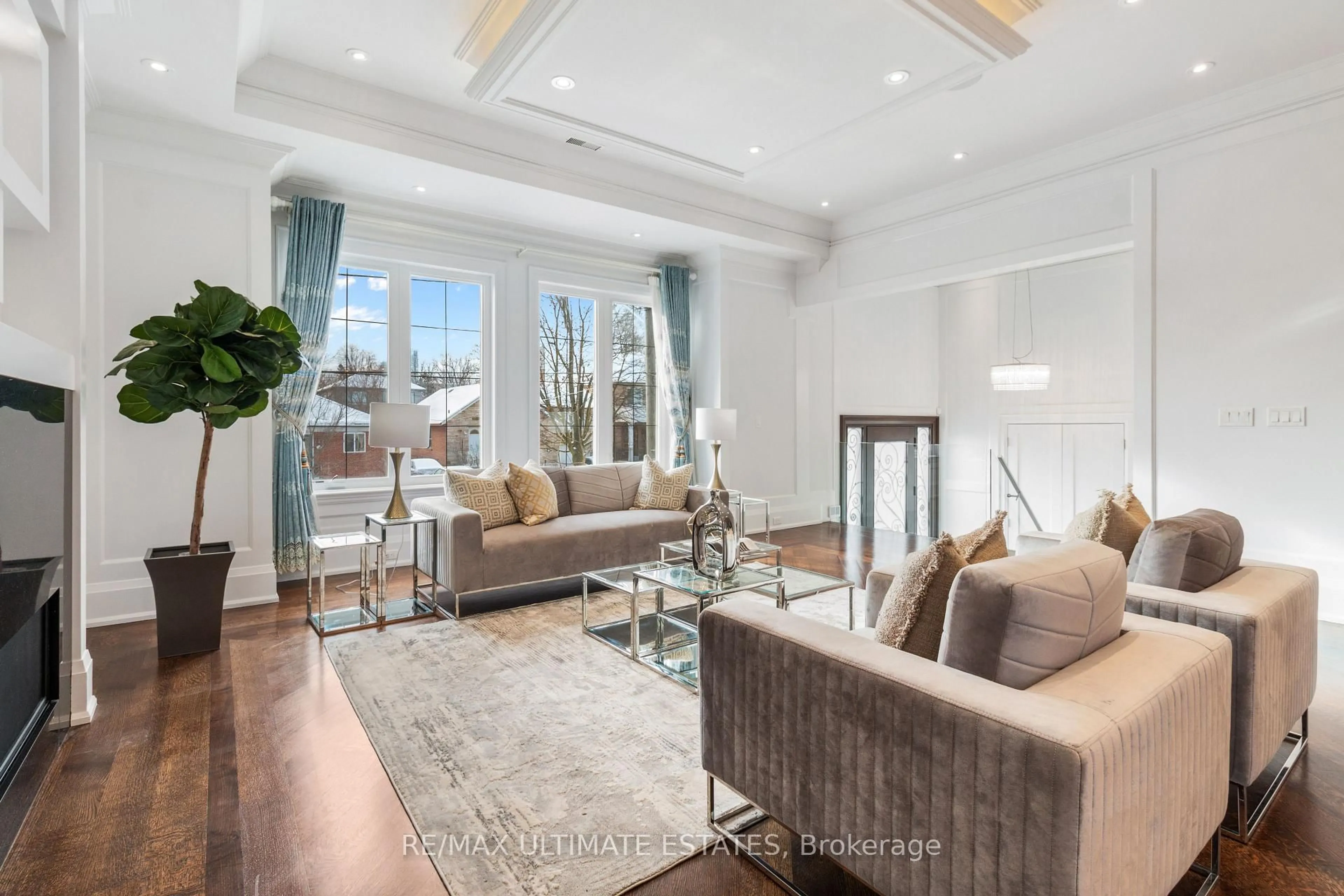 Living room with furniture, wood/laminate floor for 26 Madawaska Ave, Toronto Ontario M2M 2P9