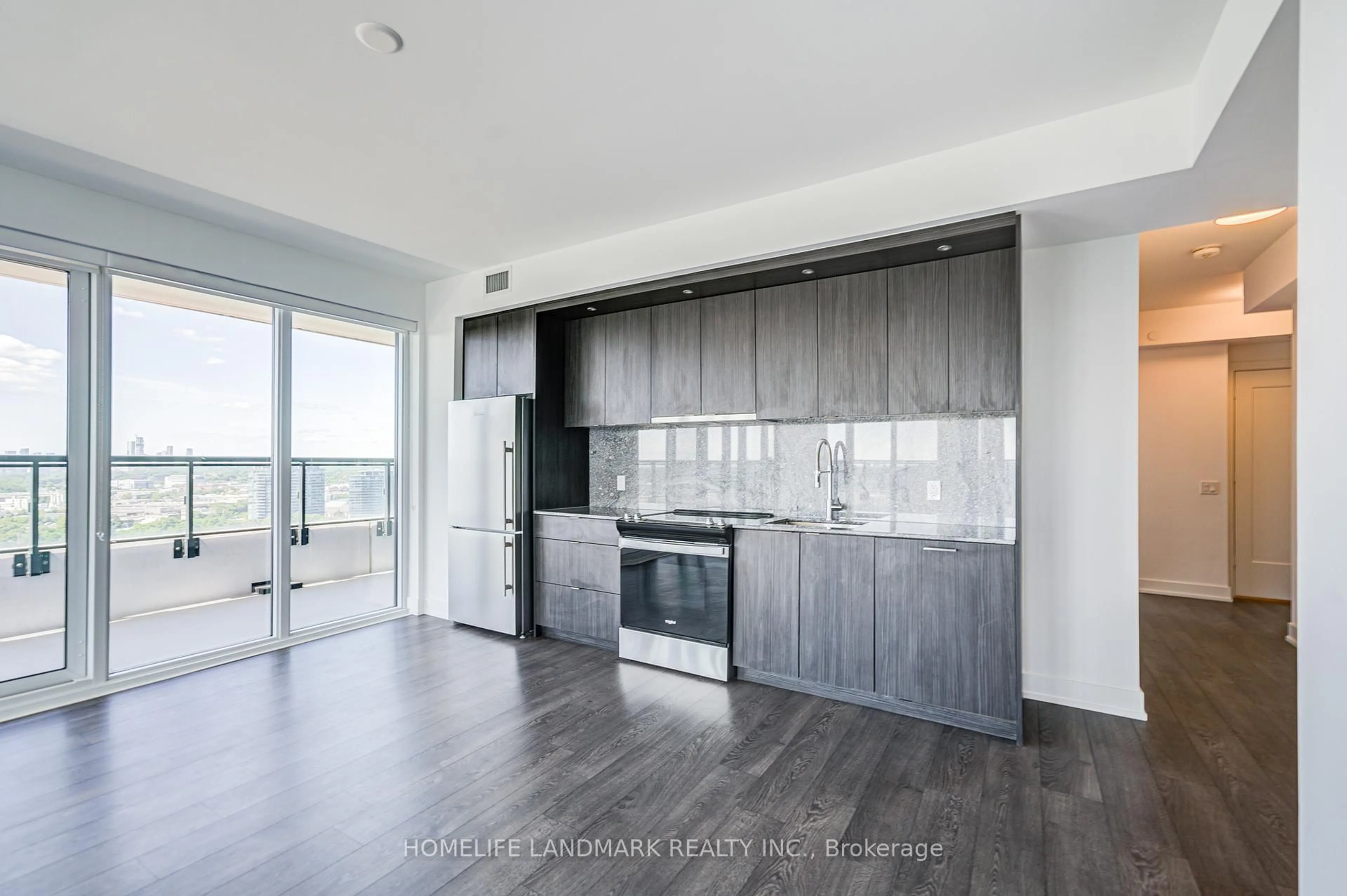Open concept kitchen, wood/laminate floor for 30 Inn On The Park Dr #2109, Toronto Ontario M3C 0P7