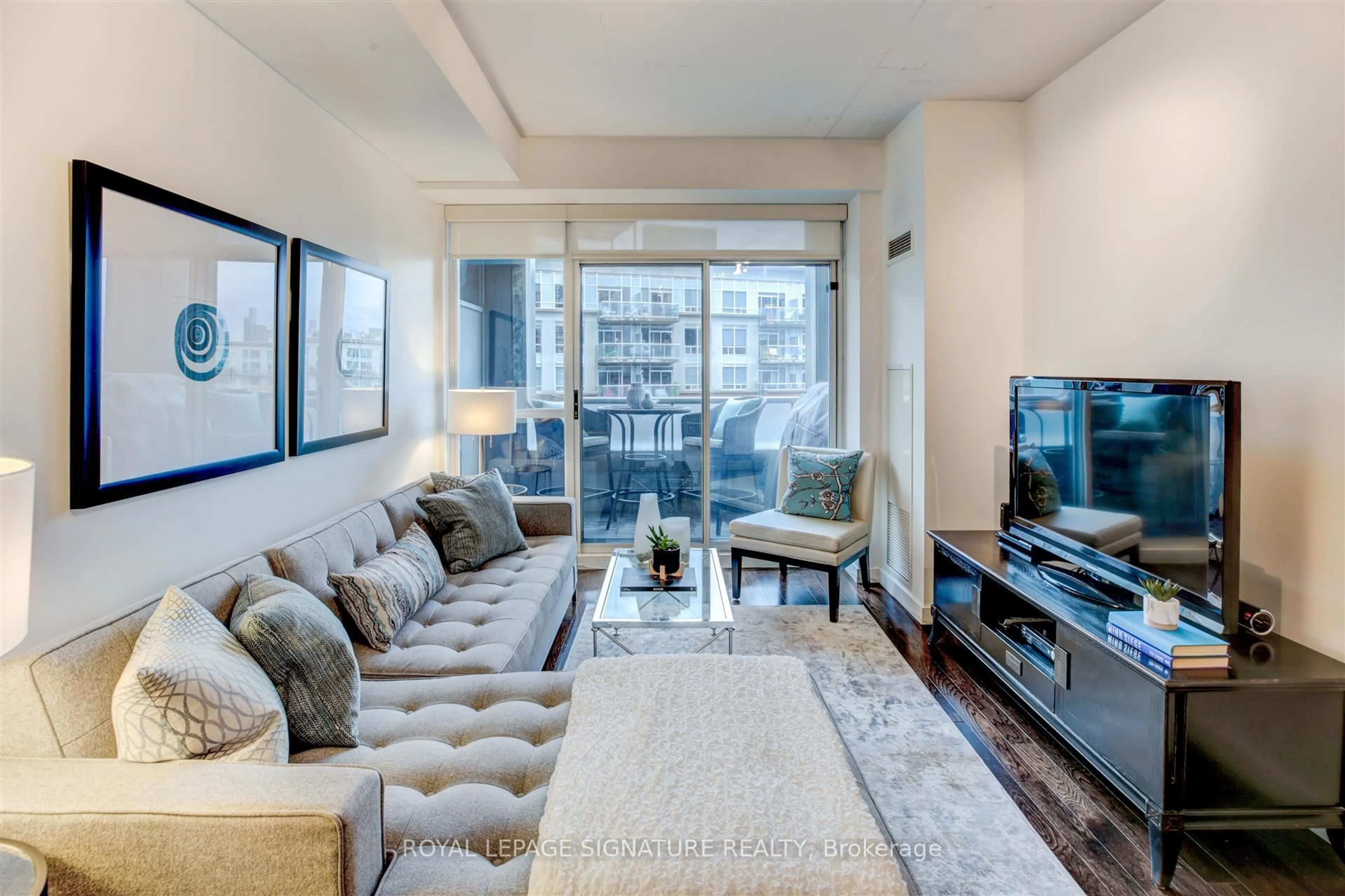 Living room with furniture, unknown for 1 Shaw St #705, Toronto Ontario M6K 0A1