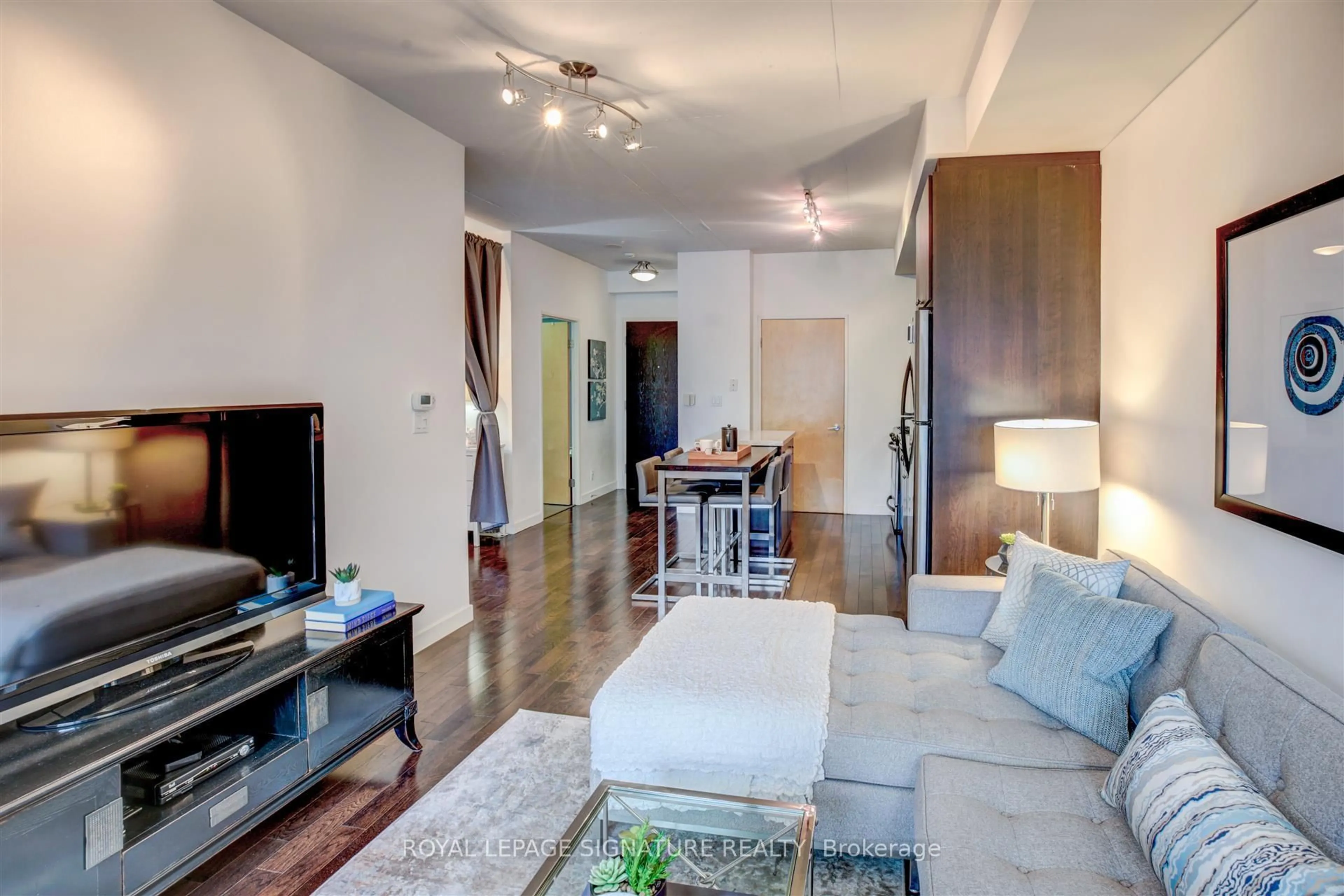 Living room with furniture, unknown for 1 Shaw St #705, Toronto Ontario M6K 0A1