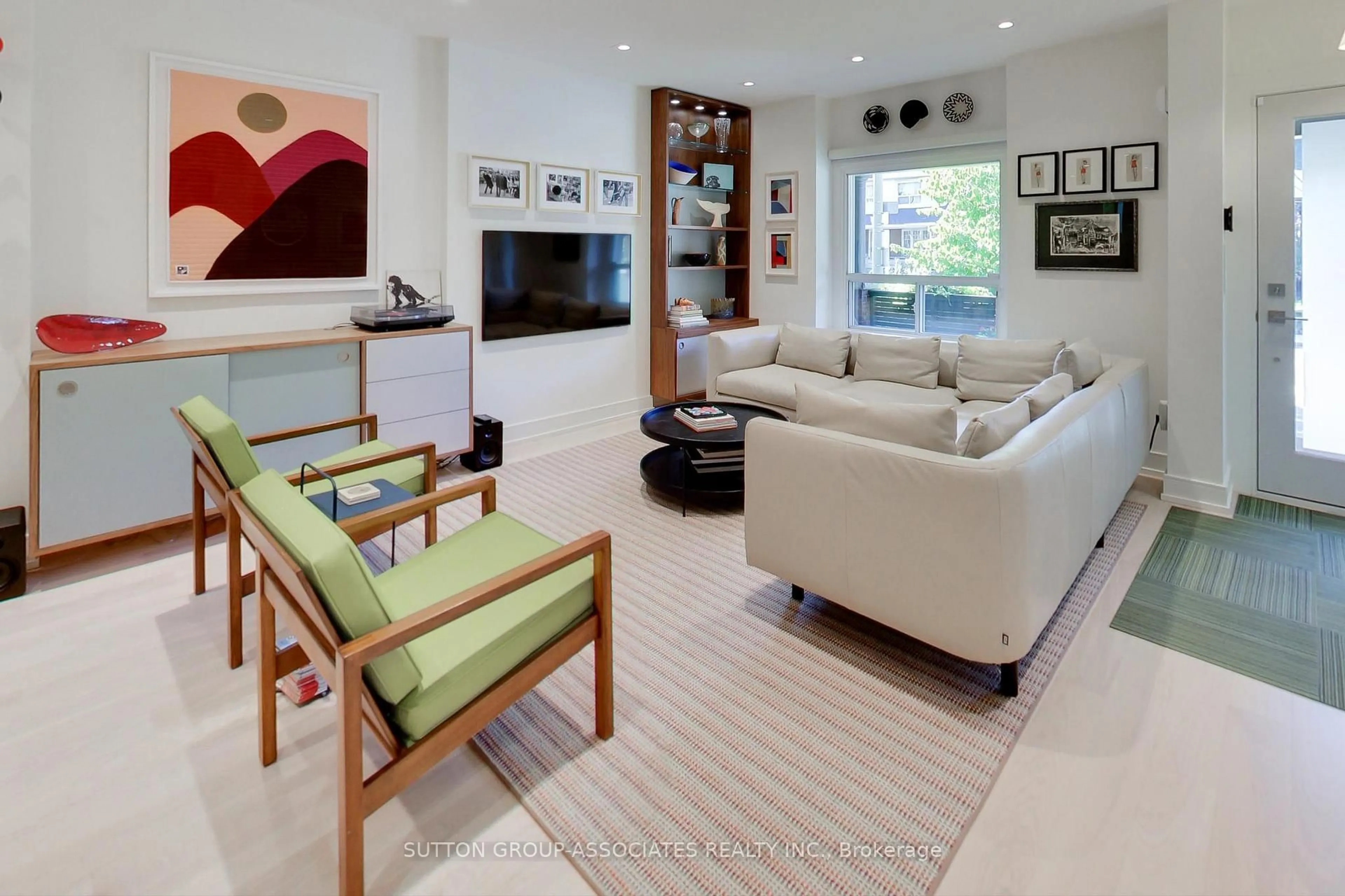 Living room with furniture, ceramic/tile floor for 19 Barrie Ave, Toronto Ontario M6C 1E1