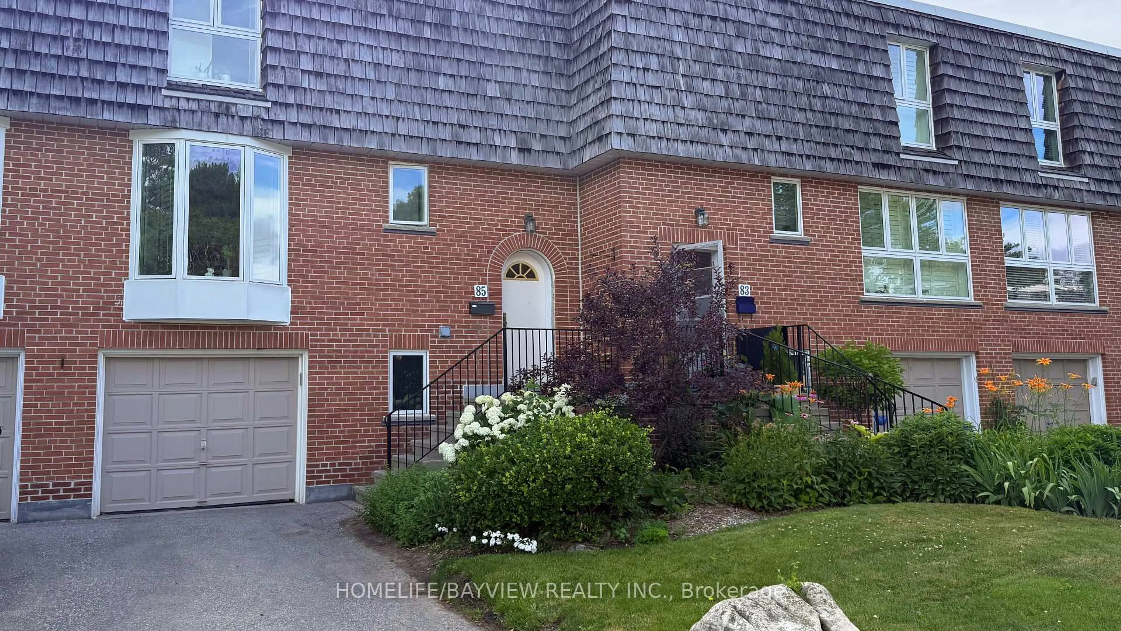Home with brick exterior material, street for 85 Crimson Millway, Toronto Ontario M2L 1T8