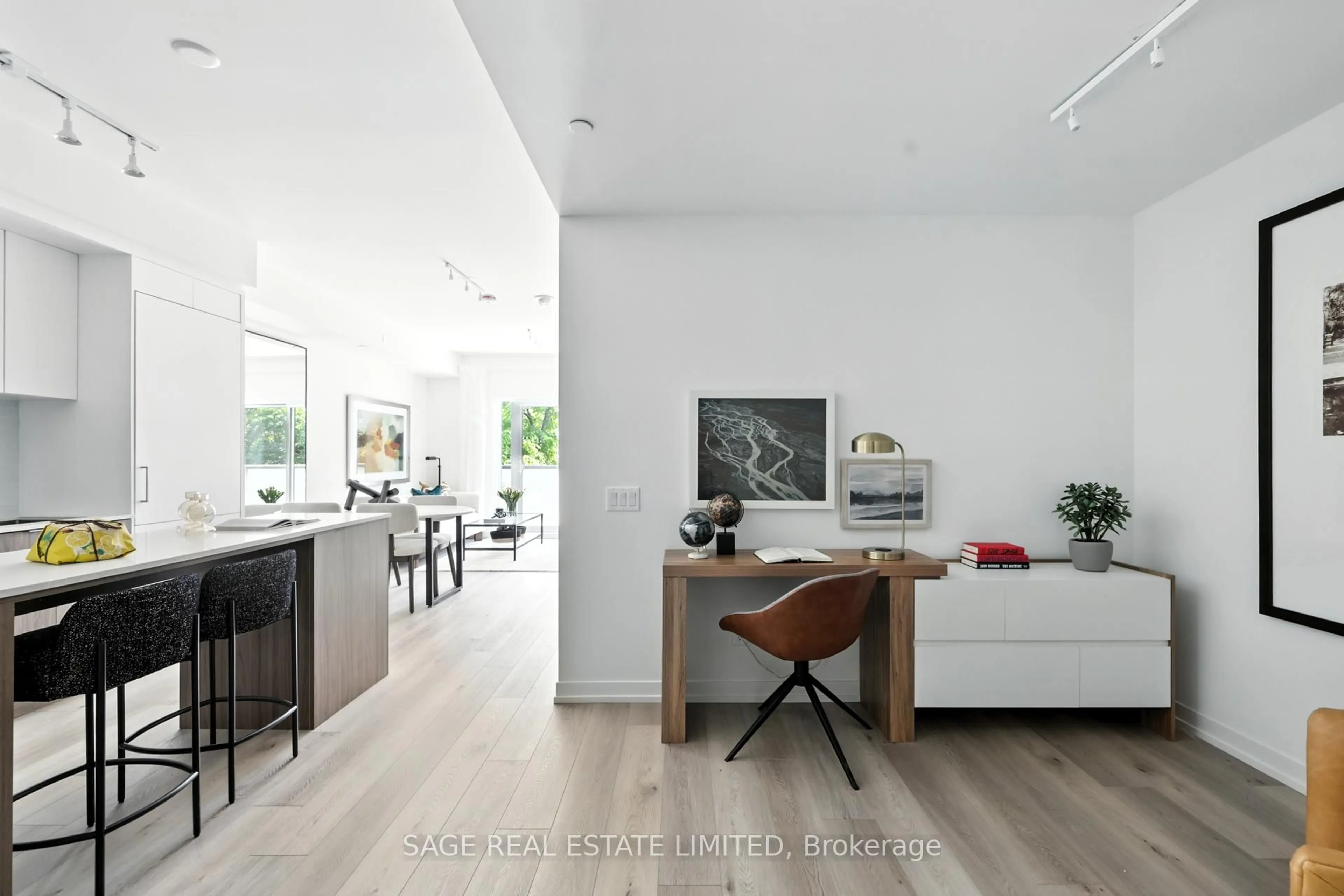 Open concept kitchen, wood/laminate floor for 863 St Clair Ave #310, Toronto Ontario M6C 1C4