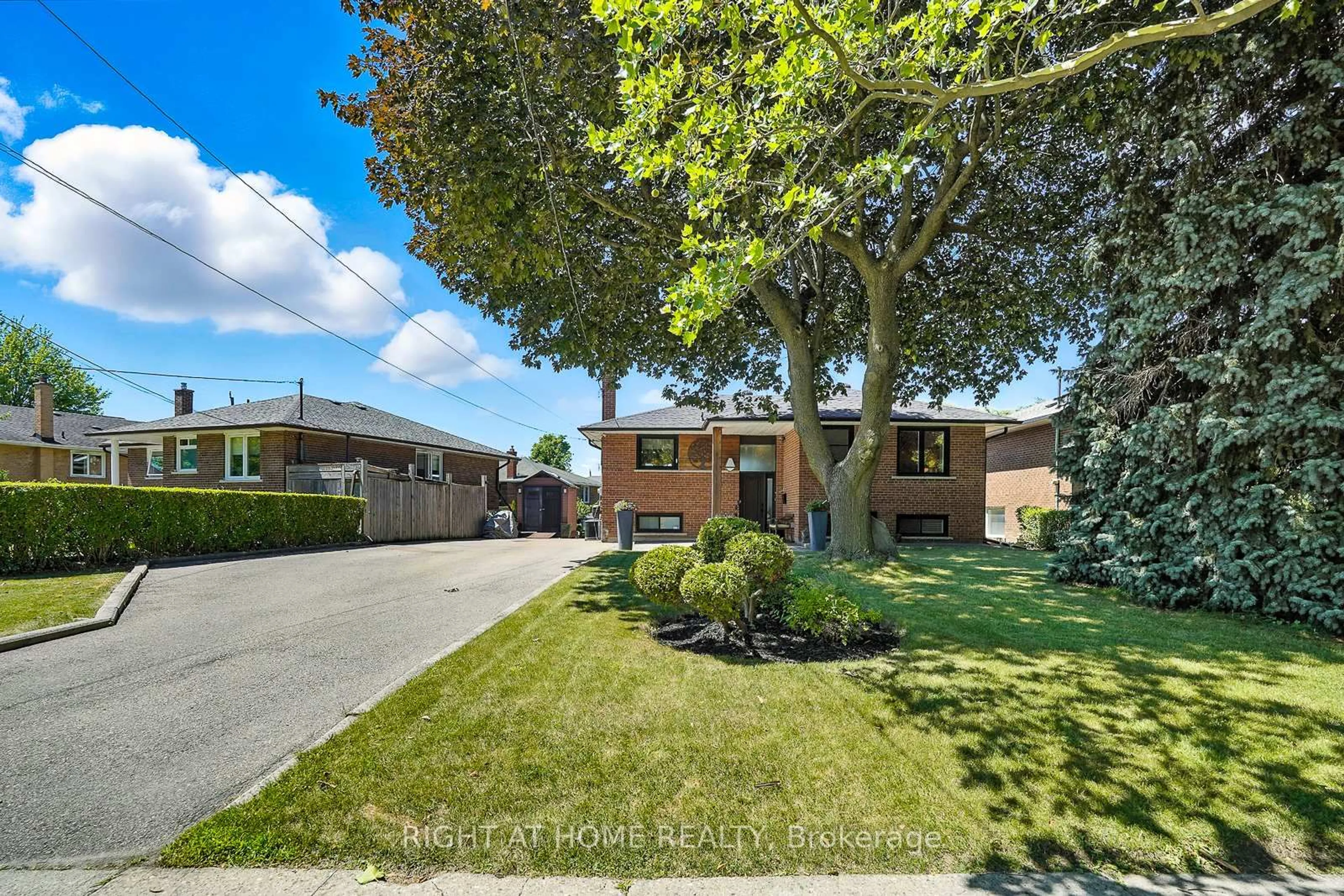 A pic from outside/outdoor area/front of a property/back of a property/a pic from drone, street for 142 Sloane Ave, Toronto Ontario M4A 2B7