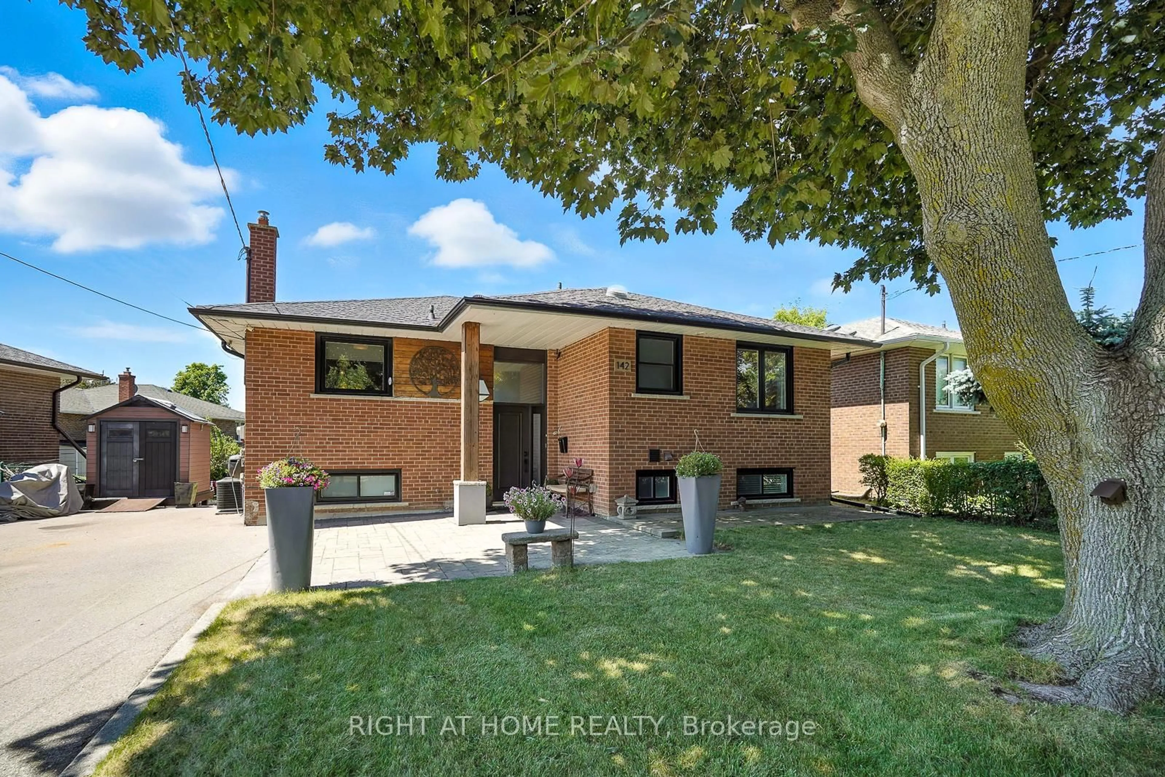 Home with brick exterior material, street for 142 Sloane Ave, Toronto Ontario M4A 2B7