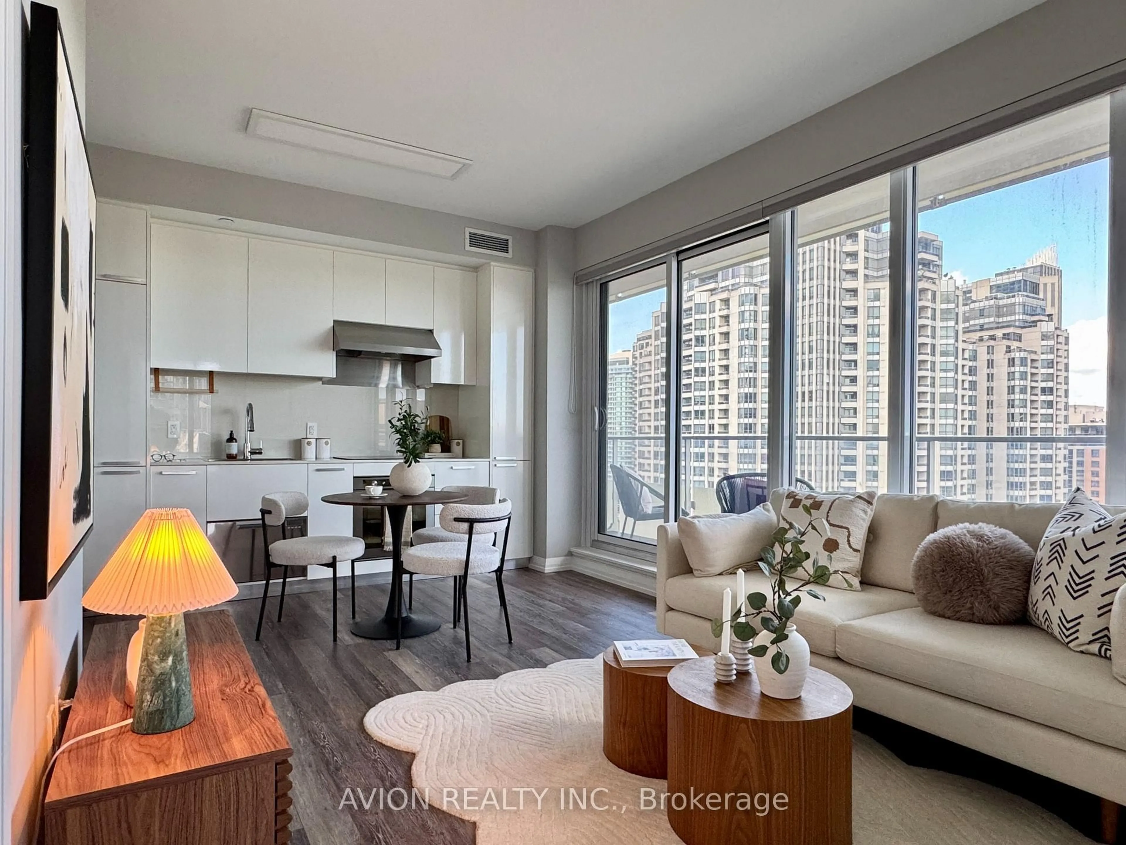 Living room with furniture, wood/laminate floor for 75 Canterbury Pl #2002, Toronto Ontario M2N 2N1