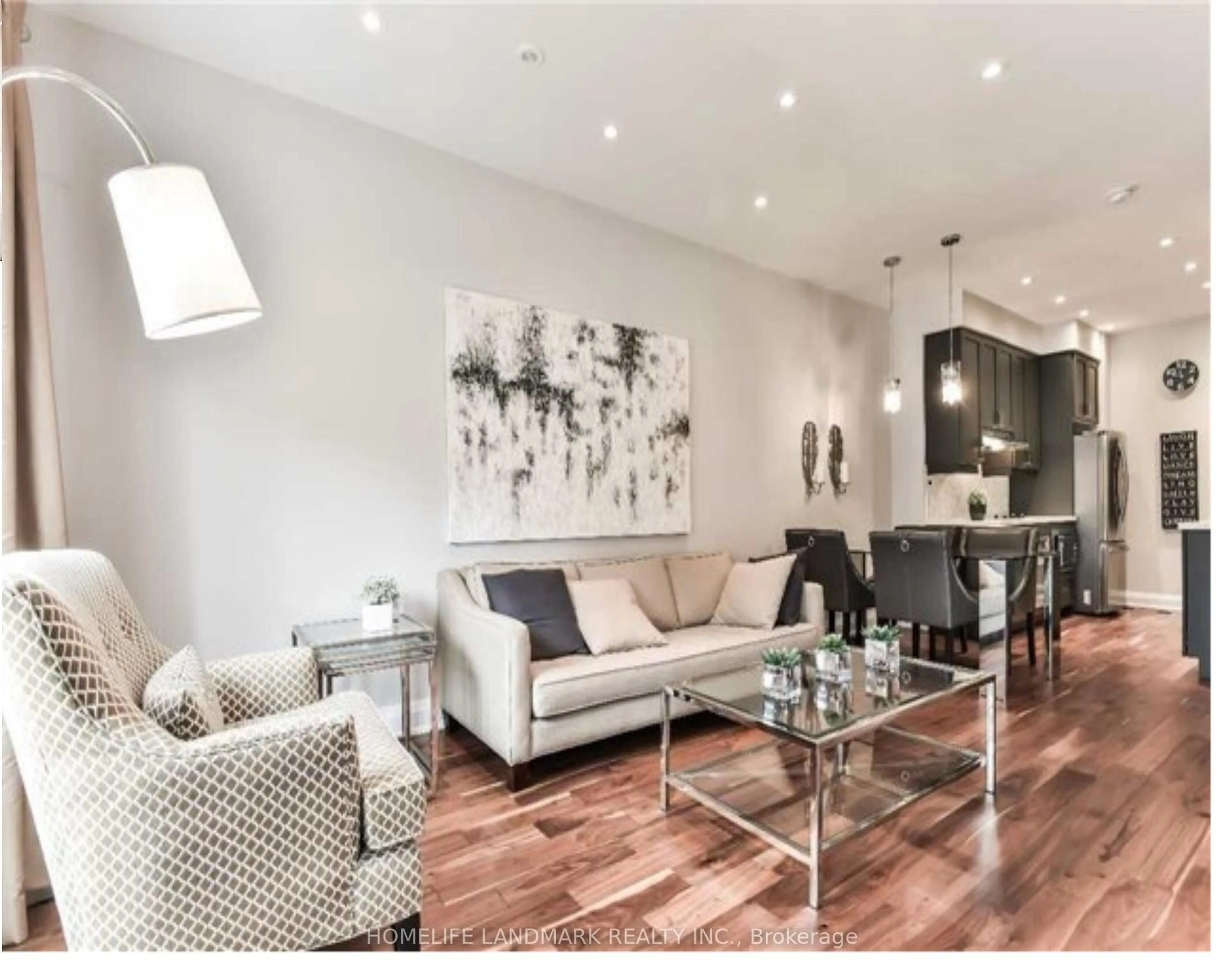 Living room with furniture, wood/laminate floor for 65 Hargrave Lane, Toronto Ontario M4N 0A4